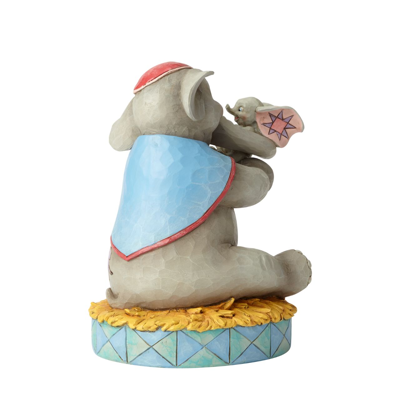 Disney Mrs Jumbo and Dumbo Figurine A Mother's Unconditional Love by Jim Shore Fiercely protective and unconditionally loving, Mrs. Jumbo cherishes her big-eared baby Dumbo. Handcrafted and hand-painted in exquisite detail, this cast stone figurine by Jim Shore makes a beautiful keepsake for Mother's Day or as a new mum gift.