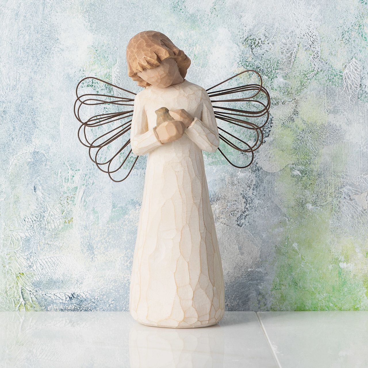 Angel of Healing by Willow Tree A gift to comfort and encourage hope and healing. "This was the first piece that I sculpted in the summer of 1999... The bird can be protection, comfort or healing. When I created it, I was thinking about the idea of fragility and how we sometimes need to heal our inside - our soul.