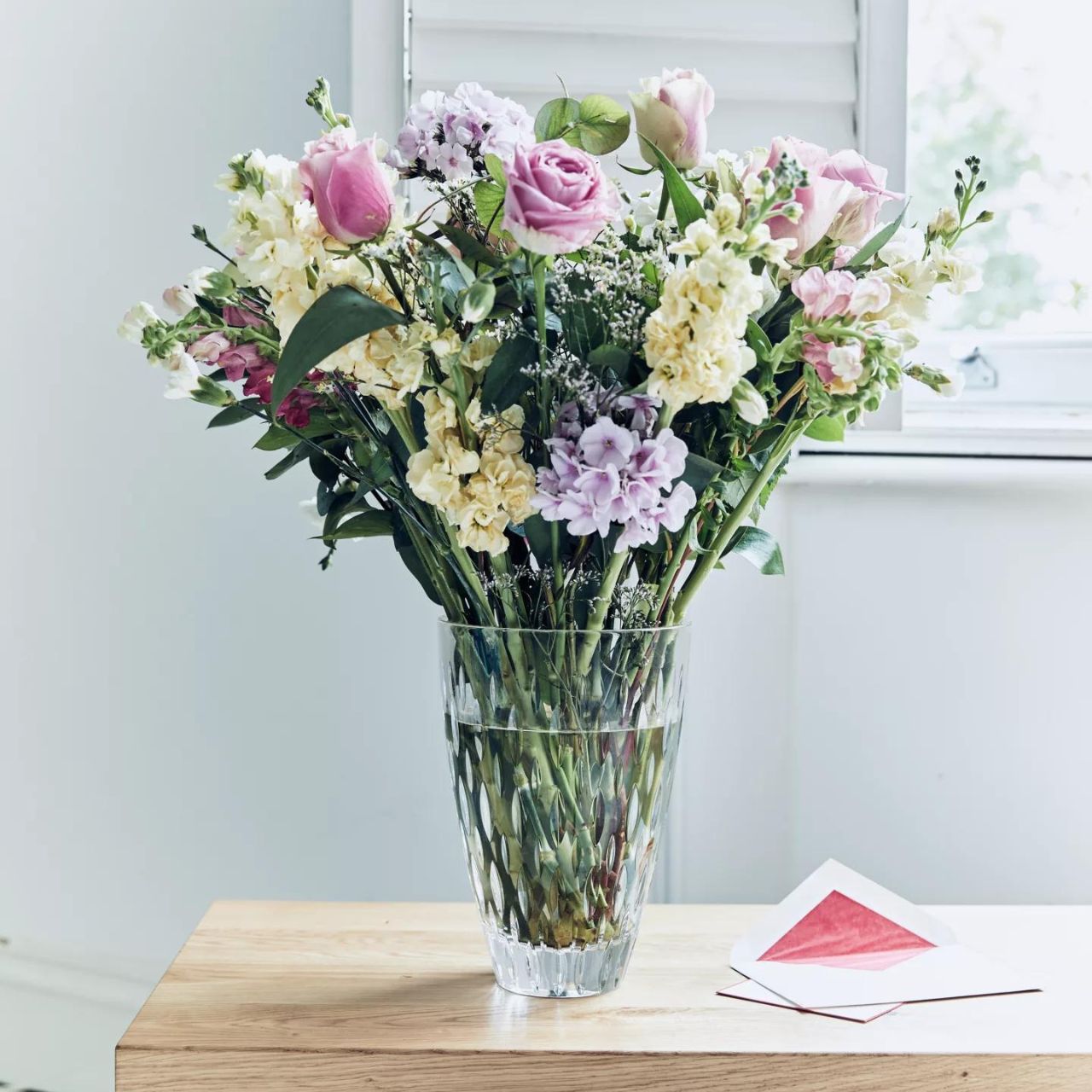 Ardan Enis 9" Vase by Waterford Crystal Inspired by the Blasket Islands, the Enis collection features a scattered geometric design of deep wedge cuts. A modern collection, perfect for every day use. This Waterford Crystal Enis 9" Vase is an elegant way to display a beautiful bouquet of flowers.