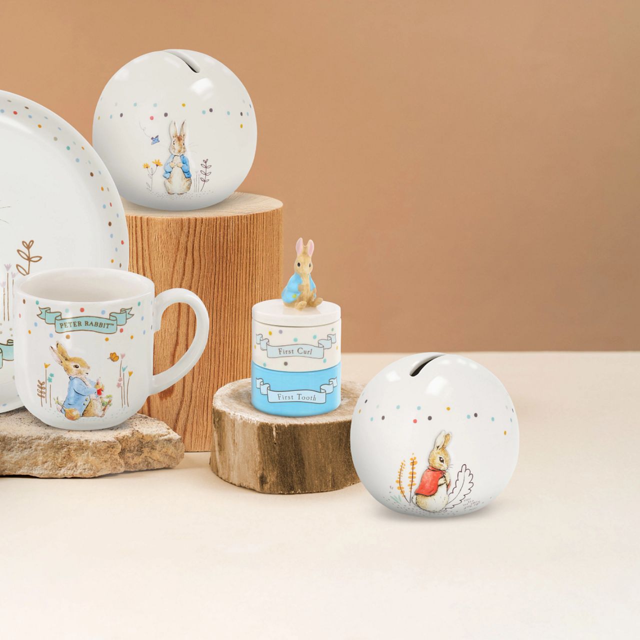 Delight your customers with our exquisite Flopsy bunny Money Bank, a must-have addition for any retail collection featuring beloved literary classics. Crafted from high-quality materials, this charming piece showcases beautifully embossed character artwork, bringing Beatrix Potter's iconic illustrations to life with intricate detail and vibrant colour.