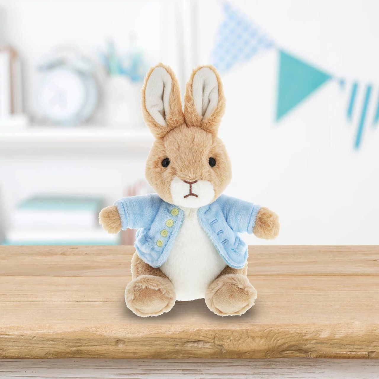 This Peter Rabbit soft toy is made from beautifully soft fabric and is dressed in clothing exactly as illustrated by Beatrix Potter, with his signature blue jacket. The Peter Rabbit collection features the much loved characters from the Beatrix Potter books and this quality and authentic soft toy is sure to be adored for many years to come.