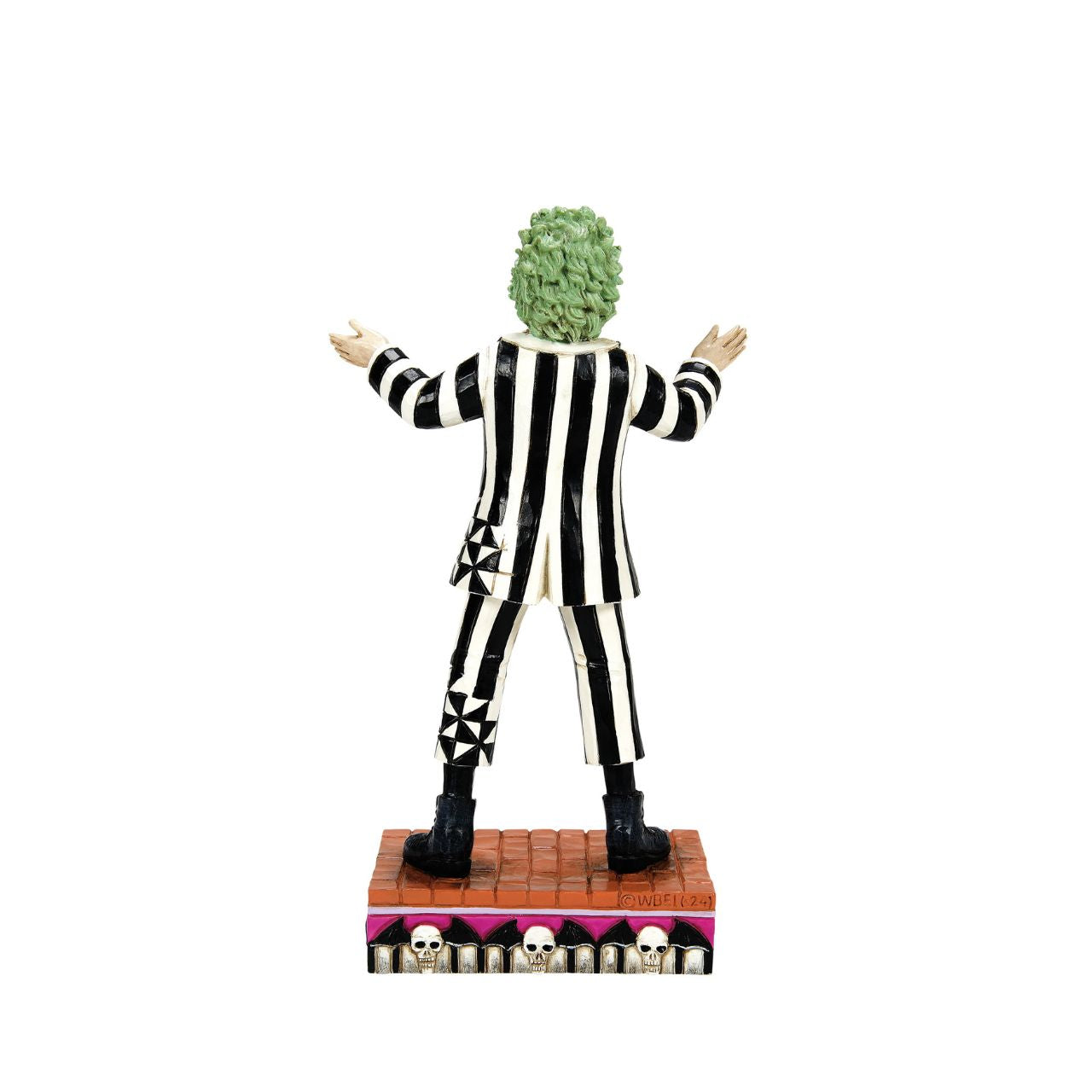 Beetlejuice, Beetlejuice, Beetlejuice... He's here. The iconic bio-exorcist from the 1988 Tim Burton film has arrived and this time, he has a Jim Shore twist. Crafted from high quality cast stone and hand-painted, this figurine features the main (dead) man himself in his classic black & white striped suit, ready to get to work ridding your home of the pesky living.
