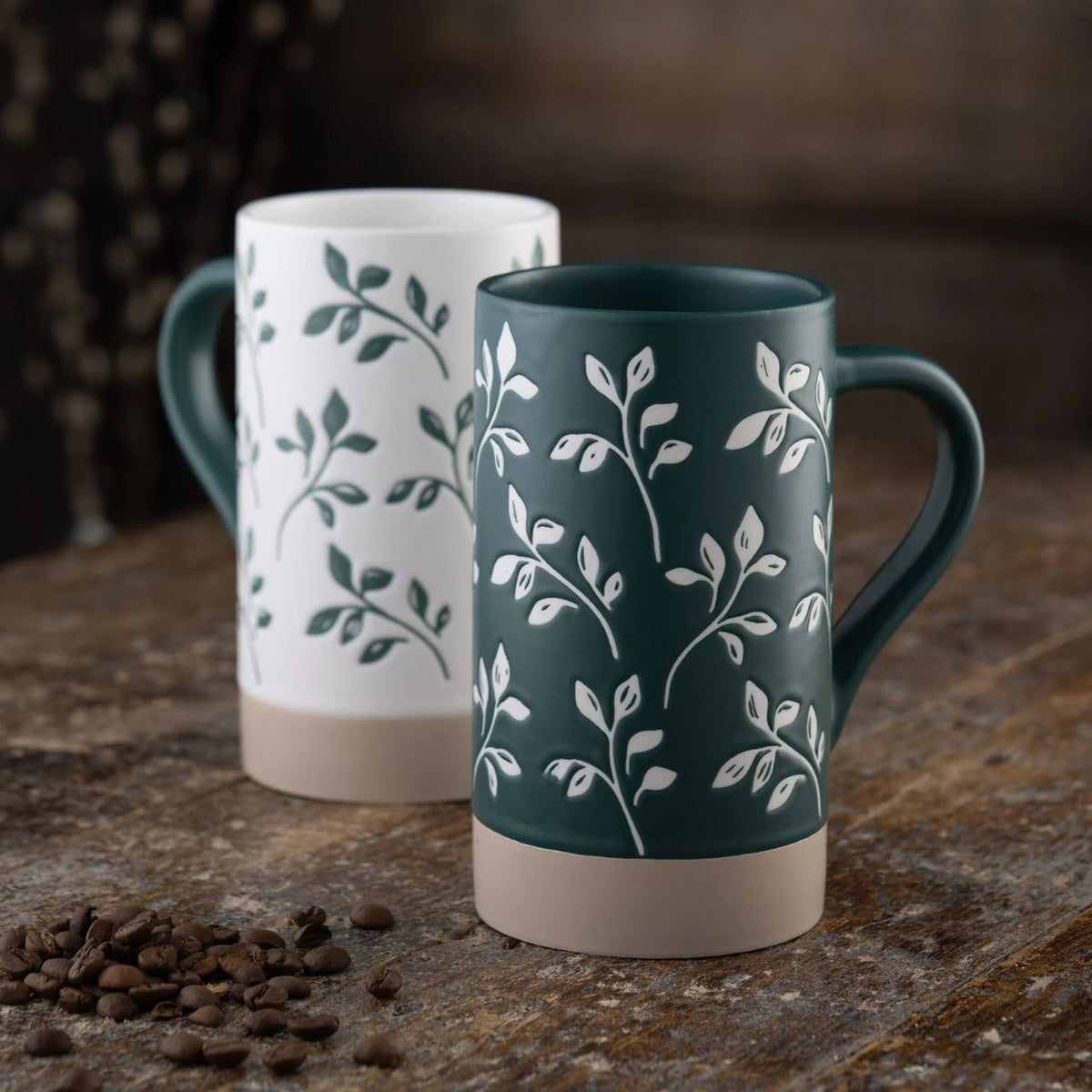 The Flora Tall Mugs are mix and match, featuring a delicate leaf pattern in two-tone colour palette of deep rich teal contrasted with classic bright white. The tall shape is perfect for homemade lattes and also ideal for tea lovers.