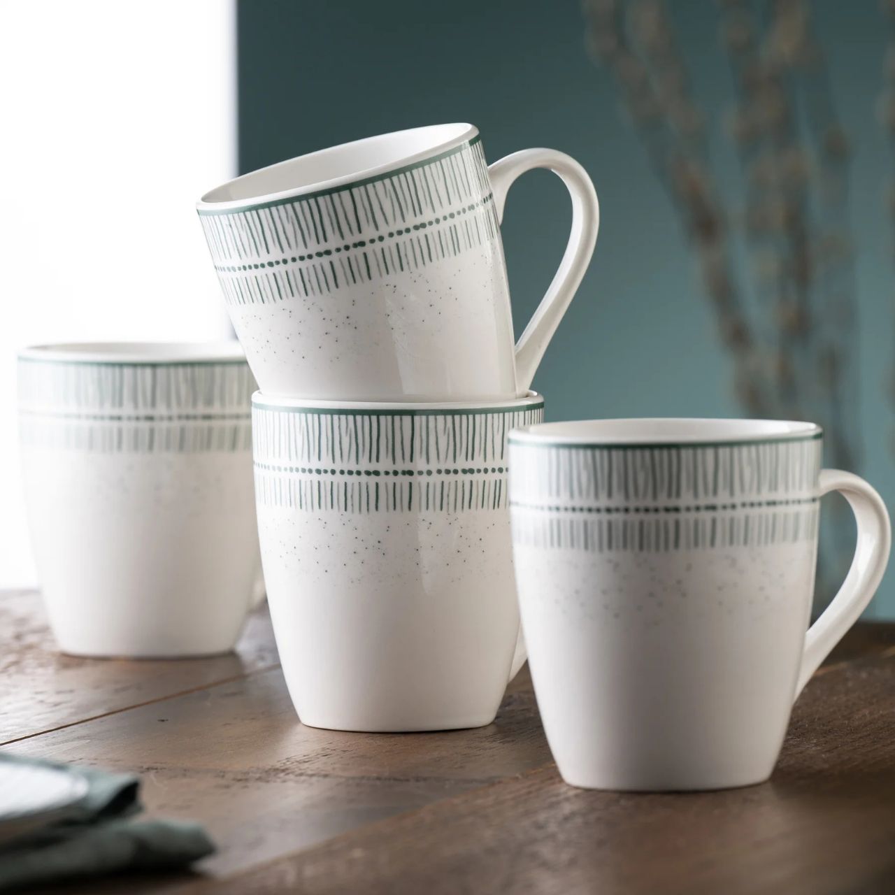 The Vigo tableware features a playful and painterly pattern in a tranquil teal tone. Vigo is suitable for both microwave and dishwasher, making it ideal for everyday use.