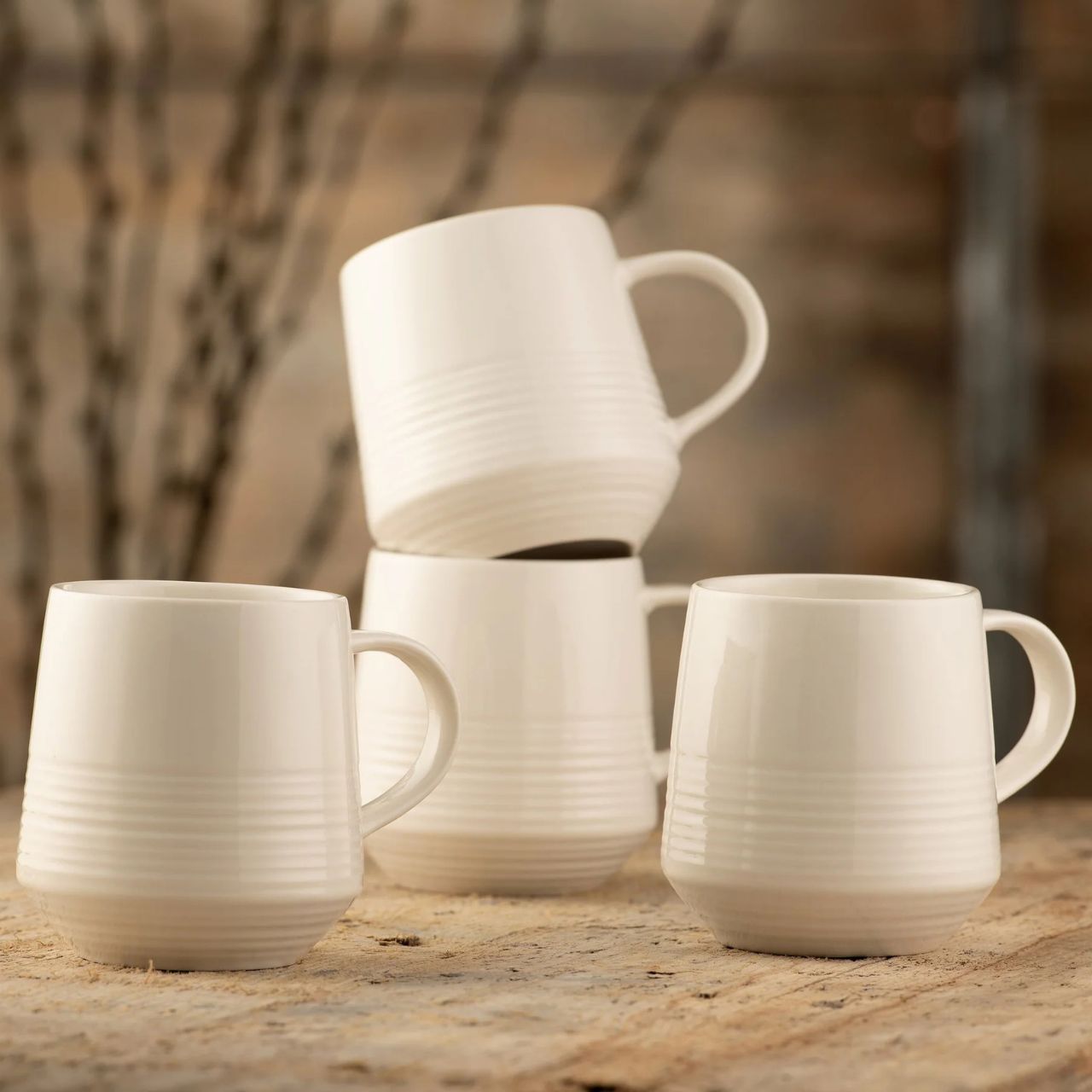 This set of 4 fine China mugs feature modern clean lines with an embossed linear pattern. They will merge seamlessly into any style whilst being practical and durable; ideal for everyday use.