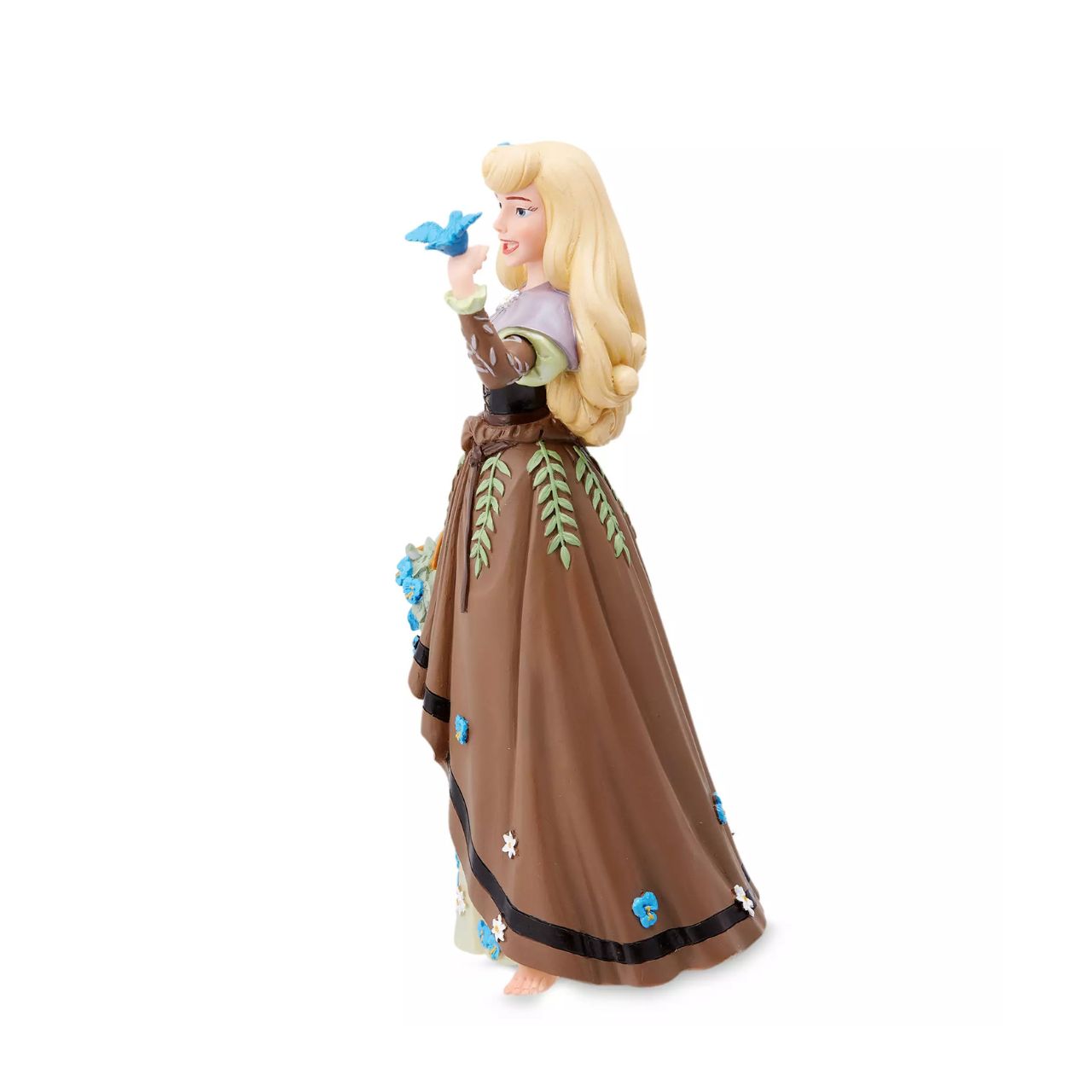 The iconic Disney princess Aurora from Sleeping Beauty is depicted here in her Briar Rose outfit. She has received the botanical treatment with delicate flowers spreading across her dress and spilling out of her basket while a bird perches on her hand.