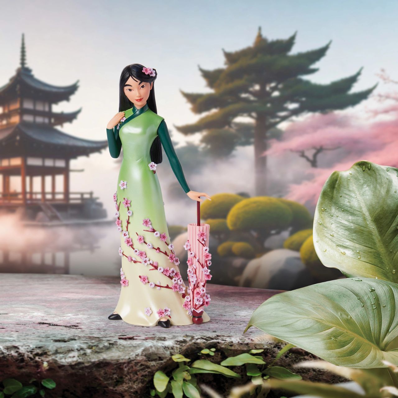 Part of the Disney Showcase Botanical collection, the Botanical Mulan figurine sees Disney's iconic princess in her gorgeous green ombre dress adorned with delicate cherry blossom petals.