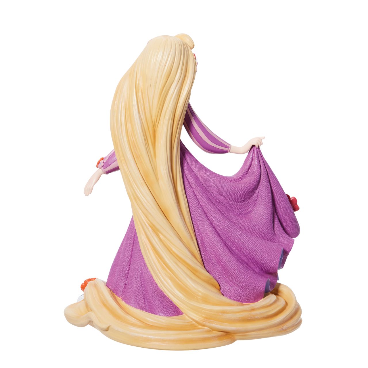 Disney Showcase shows a stunning new Botanical collection with Disney legends surrounded in 3D sculpted florals. No detail is overlooked, from a textured dress to sculpted florals, this figurine from Disney' animated film Tangled is made from cast stone.
