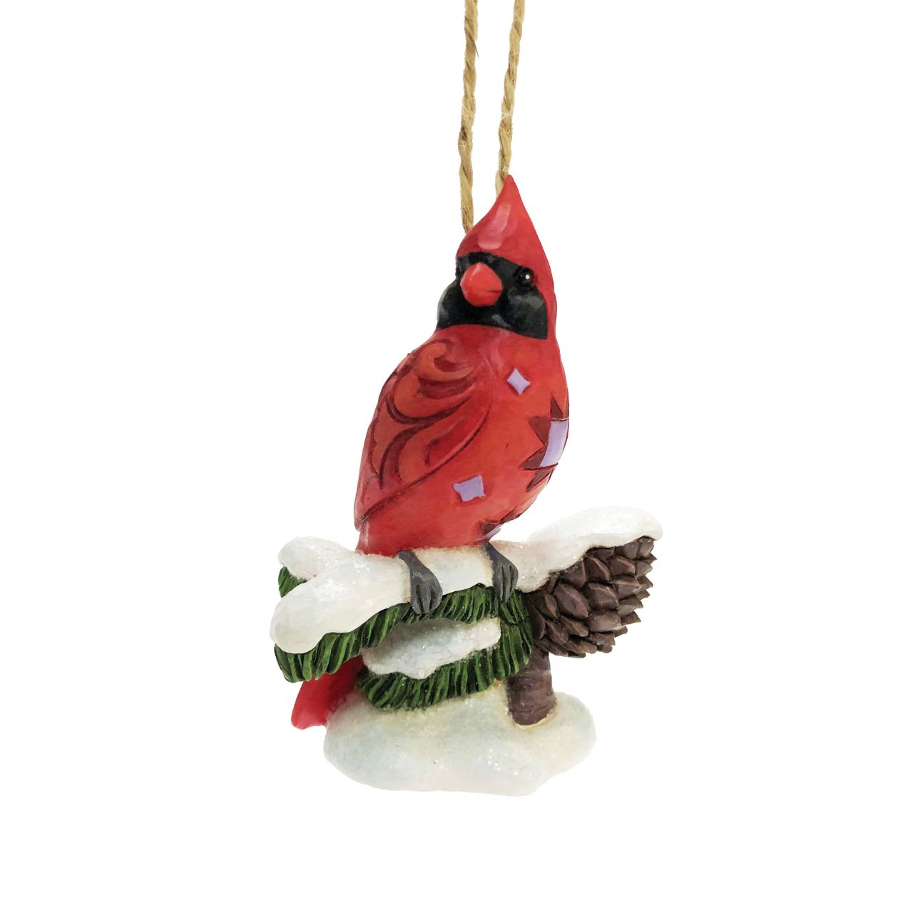 Carving Cardinal Hanging Ornament by Jim Shore  Celebrate Christmas with this beautiful hand crafted and hand painted Carving Cardinal on Snowy Branch Hanging Ornament. Decorate your tree this Christmas with this Carving Cardinal on Snowy Branch Hanging Ornament.