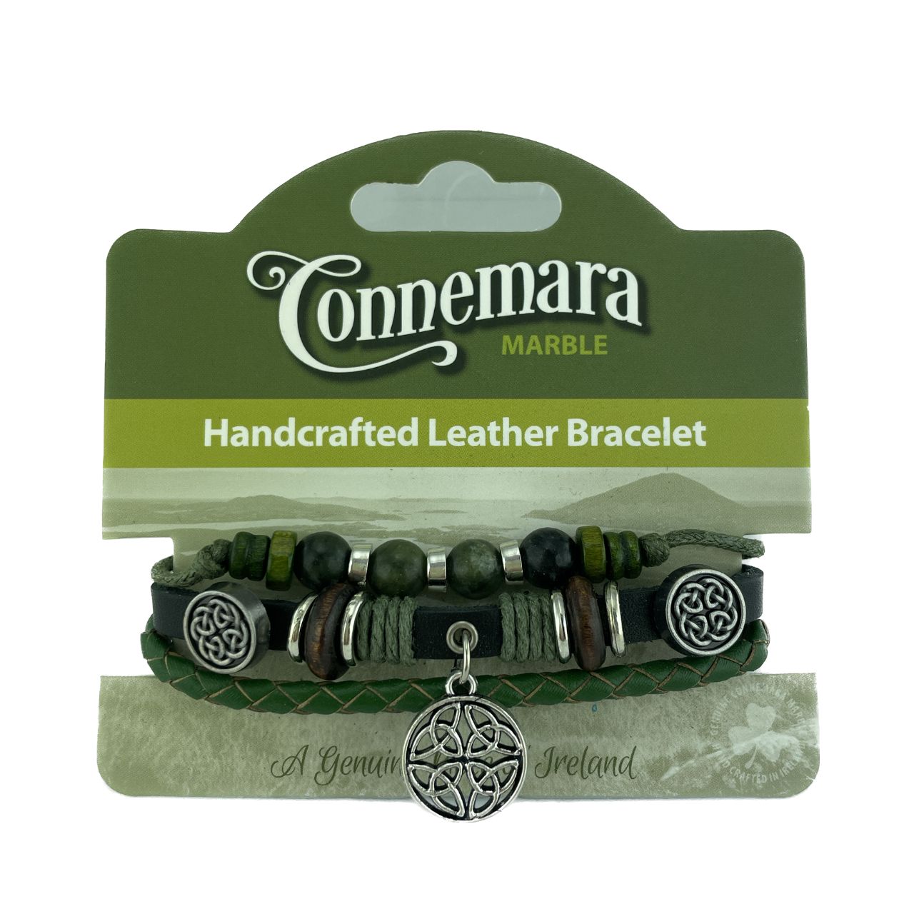 This Connemara Marble Celtic Knot Charm Bracelet combines authentic Irish craftsmanship with natural elegance. Featuring a genuine Connemara marble bead paired with a finely detailed Celtic knot charm, it is strung on durable leather for a comfortable, adjustable fit.