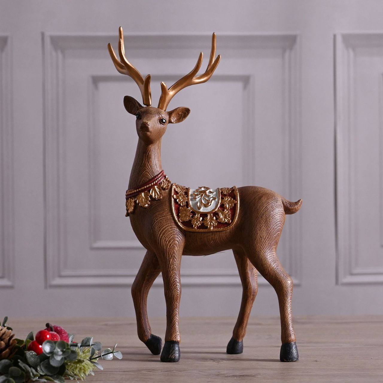 Christmas Standing Reindeer Decoration A standing Christmas reindeer. This charming Christmas decoration perfectly blends traditional and modern touches this festive season.