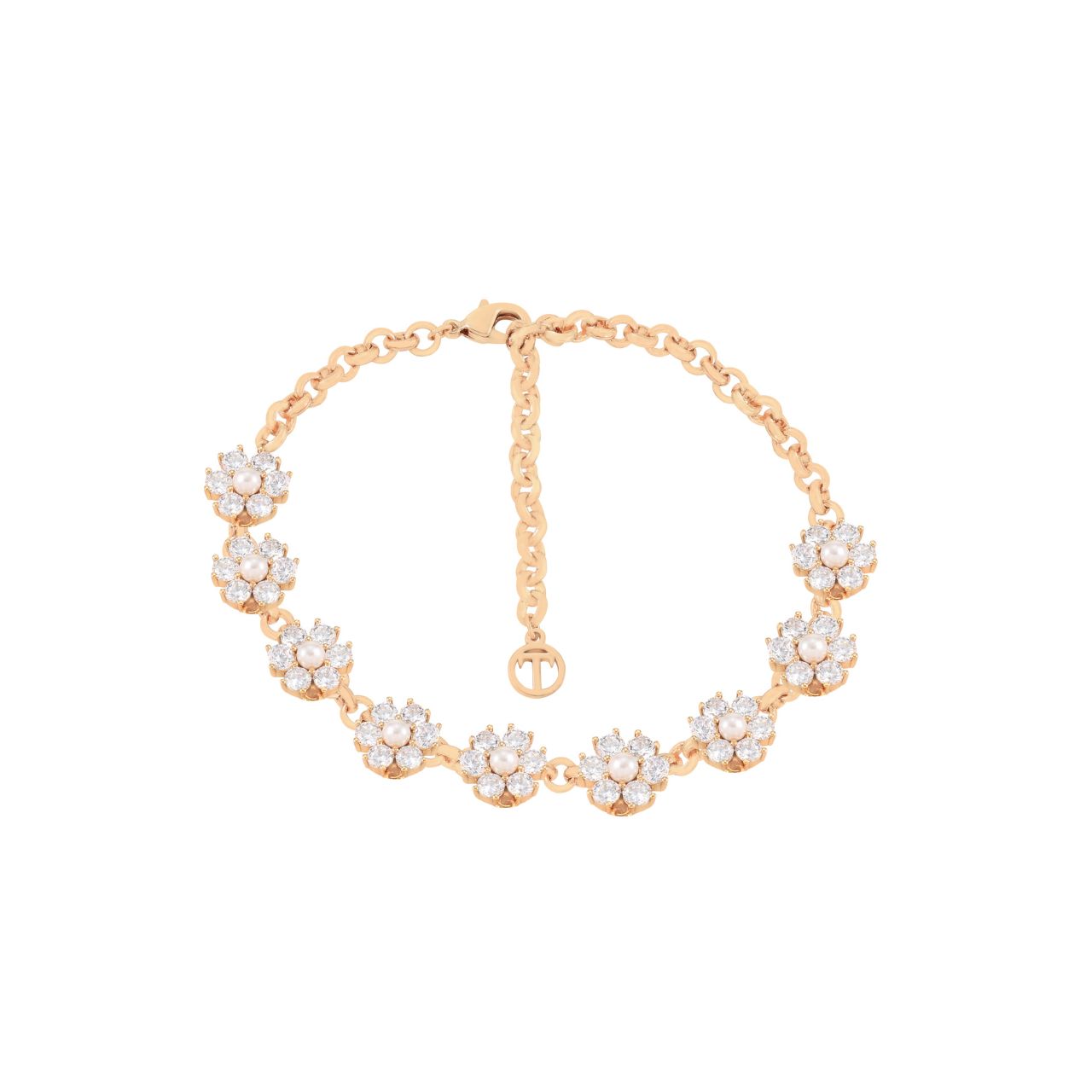 Elevate your elegance with the Tipperary Daisy CZ & Pearl 9 Daisy Bracelet in Gold. This refined piece showcases nine delicate daisies adorned with shimmering cubic zirconia and lustrous pearls, perfectly blending classic charm with modern sophistication.