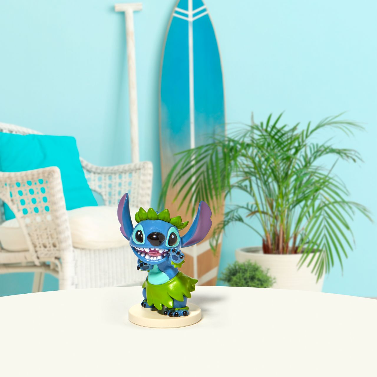 Grand Jester Studios Dancing Stitch Mini Figurine This cute and fun dancing Stitch mini figurine by Grand jester Studios is the perfect addition to any Stitch or Disney collection. Dressed in his finest grass skirt, Stitch is ready to show off his dancing skills at the luau.