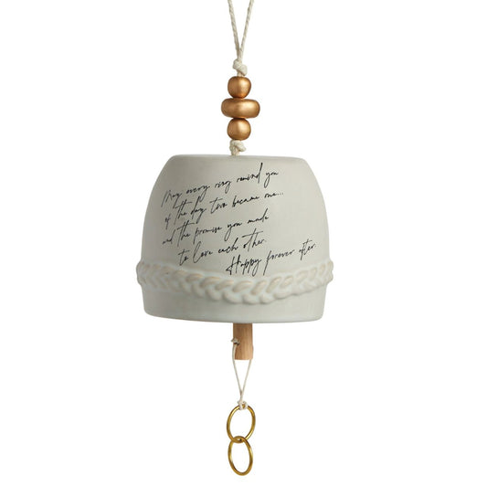 Inspired Bell - Wedding by Demdaco  Give beauty and relaxation with our Inspired Bells collection, a selection of artisan bells in soft, serene colours with soothing, gentle rings bearing sentiments of faith and love. Our Inspired Bell - Wedding is a ceramic indoor/outdoor bell in white with a pull made of two golden rings. The sentiment on the bell reads, "May every ring remind you of the day two became one… and the promise you made to love each other. Happy forever after."