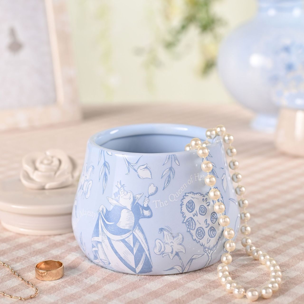 A Disney Alice in Wonderland Trinket Box, an officially licensed product that is tailor-made for superfans.