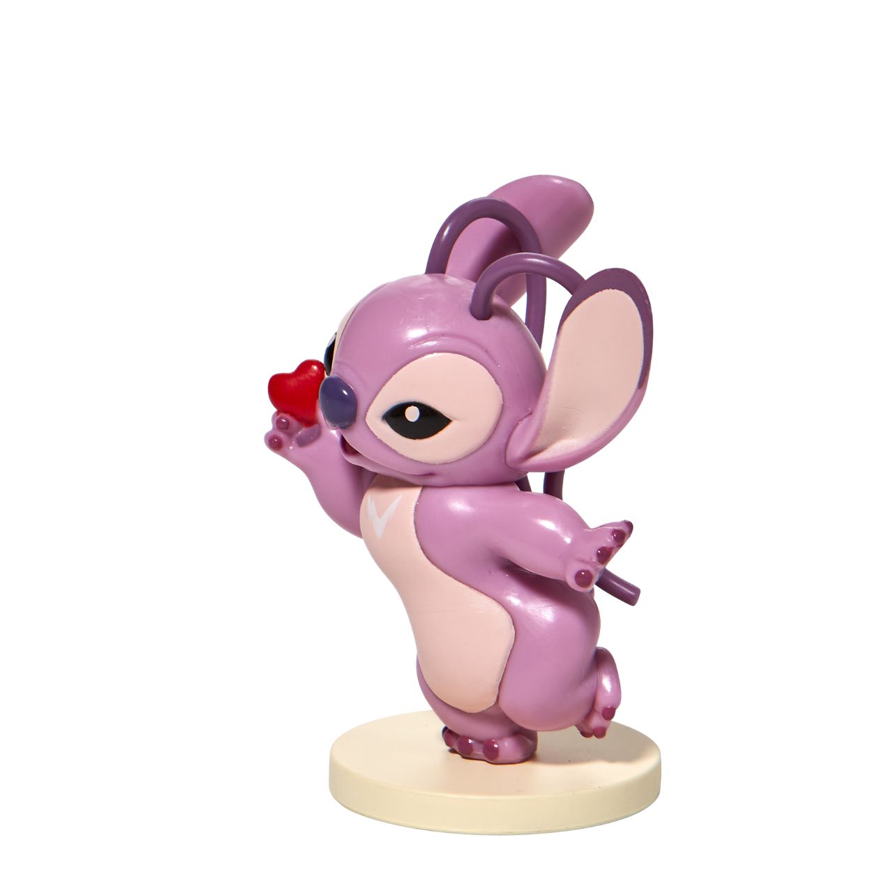 Stitch Angel with Heart Mini Figurine This super cute Angel mini figurine is holding a little red heart just for you. Angel is the girlfriend of Stitch and is sweet and loving. This is the perfect addition to any Stitch or Disney collection. Made from high quality vinyl.