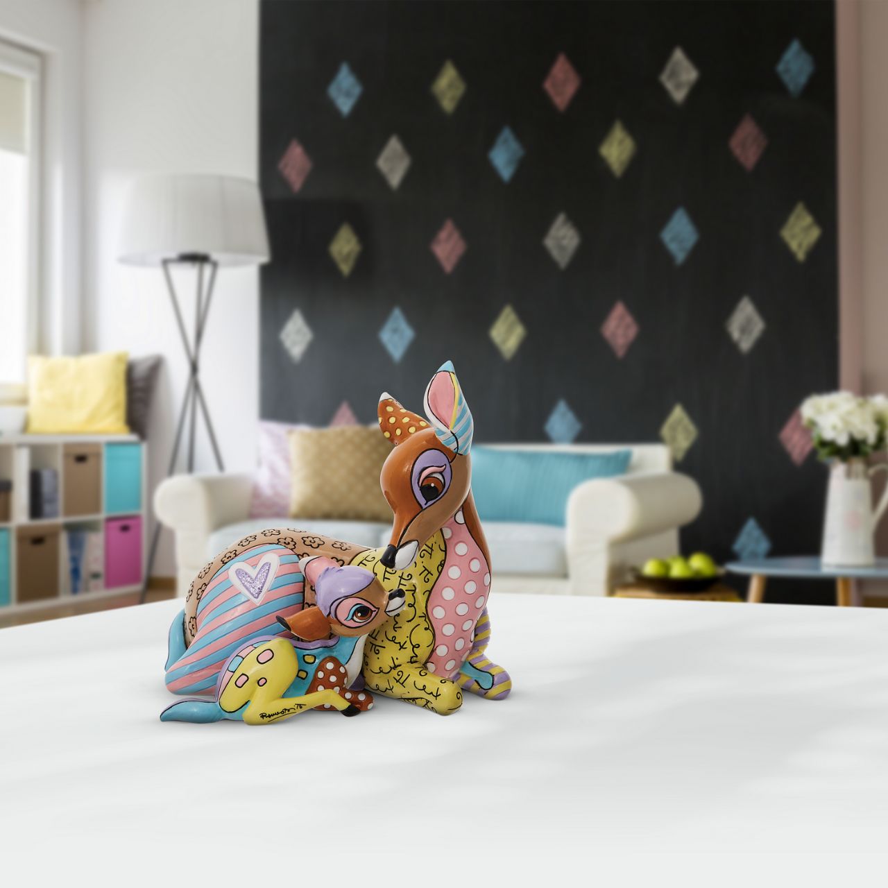 Romero Britto captures a precious moment between a mother and her Young Prince in this heart-warming figurine. Celebrate Bambi's 80th anniversary with this colourful, contemporary pop art piece.