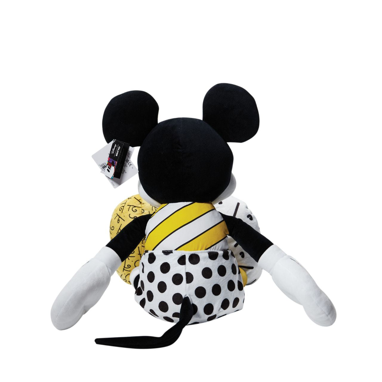This large Mickey Mouse Midas Plush is as huggable as ever. This soft toy is coated in Britto's signature style, with bold patterns in a restrained colour palette and Mickey Mouse's signature clothing. This soft toy is sure to be adored for many years to come. Ages 1+