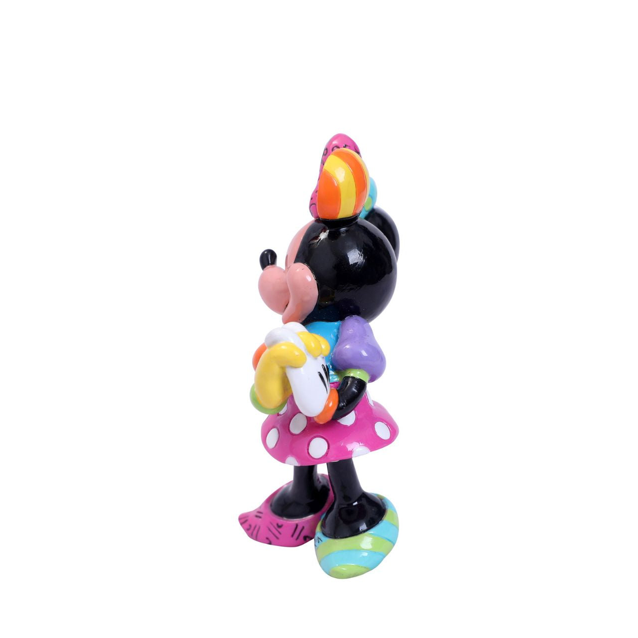 Blushing and smiling, Minnie eagerly awaits a gift from her beloved Mickey. Minnie Mouse is garbed in a beautiful rainbow of colours and patterns, compliments of a special paint job by Romero Britto, a multi-talented Brazilian pop artist.