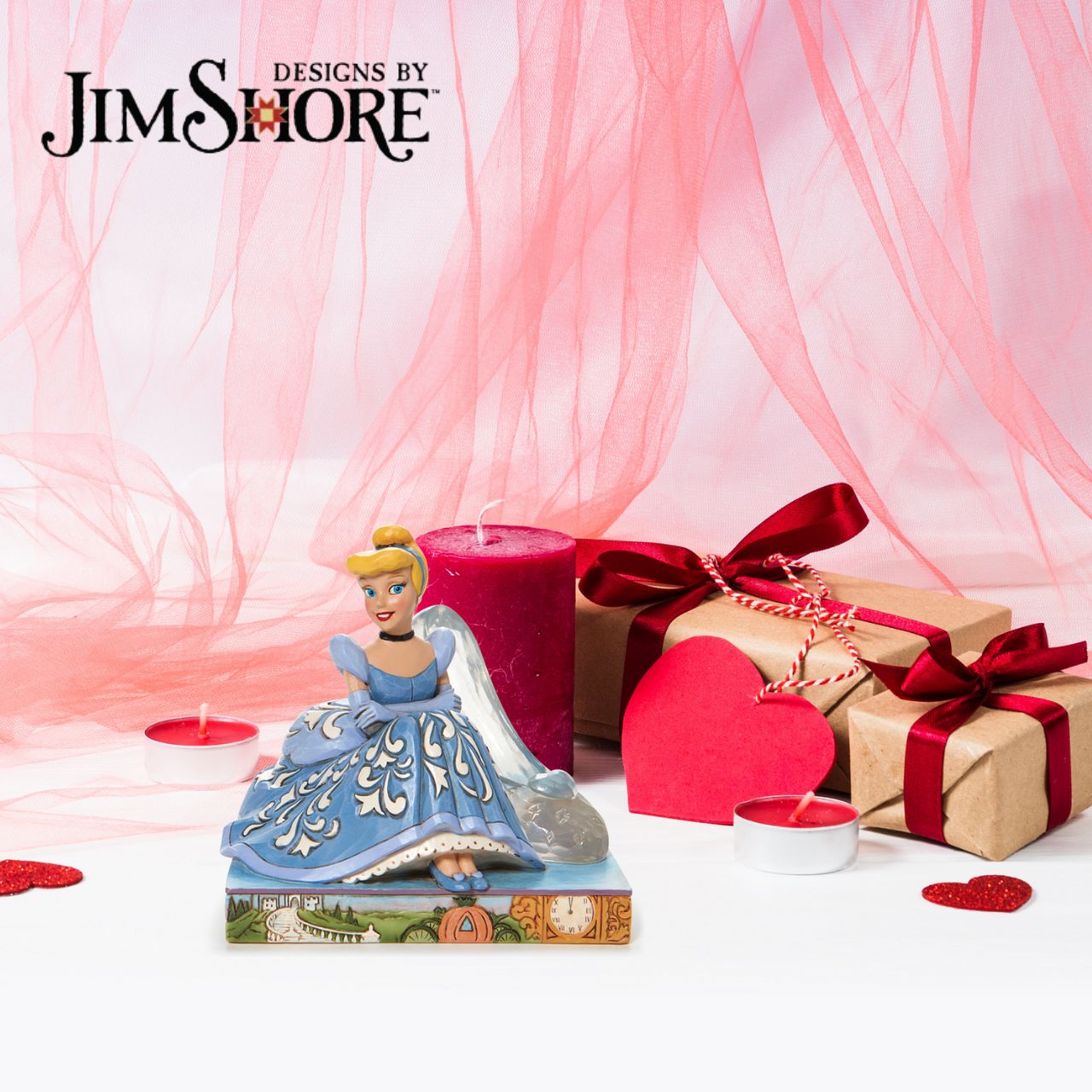 Disney Traditions Cinderella Glass Slipper Figurine This Disney Traditions line by Jim Shore features iconic Walt Disney princesses with their famous props highlighted. With a base illustrating her story, this piece features Cinderella in her brilliant blue gown with a glass slipper.