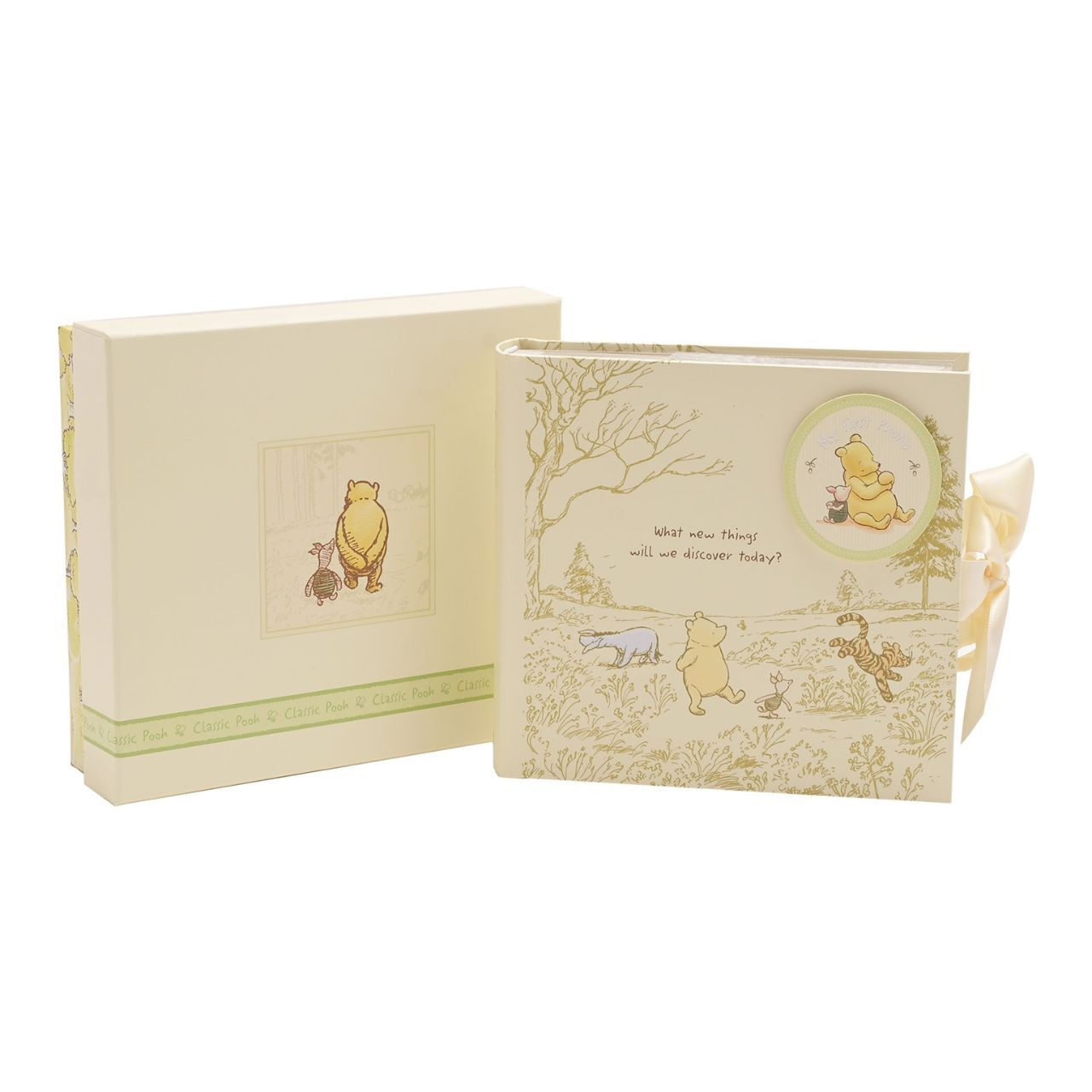 Disney Classic Pooh Heritage Photo Album Box My First Photos This Winnie the Pooh keepsake photo album has been designed to reflect E.H. Shepard's original illustrations from the original A. A. Milne books, to be cherished for many years. Includes 80 photo sleeves.