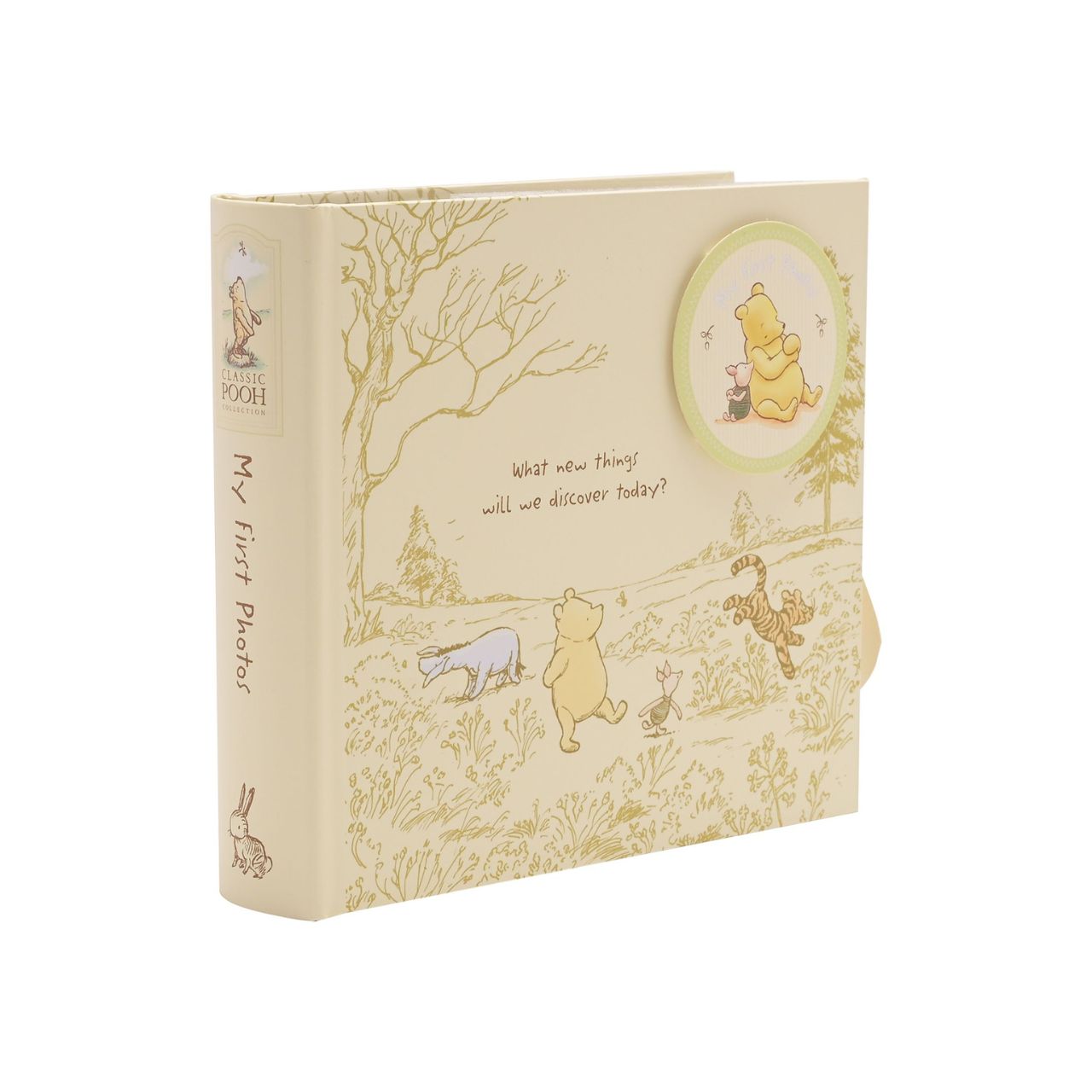 Disney Classic Pooh Heritage Photo Album Box My First Photos  This Winnie the Pooh keepsake photo album has been designed to reflect E.H. Shepard's original illustrations from the original A. A. Milne books, to be cherished for many years. Includes 80 photo sleeves.