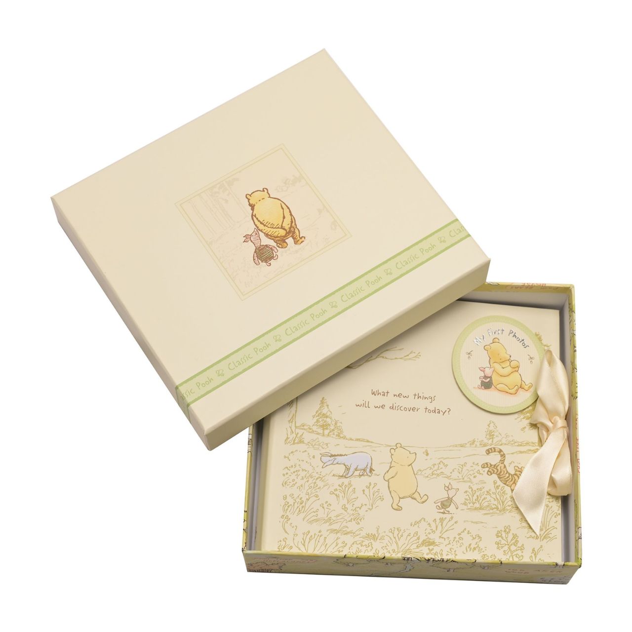 Disney Classic Pooh Heritage Photo Album Box My First Photos This Winnie the Pooh keepsake photo album has been designed to reflect E.H. Shepard's original illustrations from the original A. A. Milne books, to be cherished for many years. Includes 80 photo sleeves.