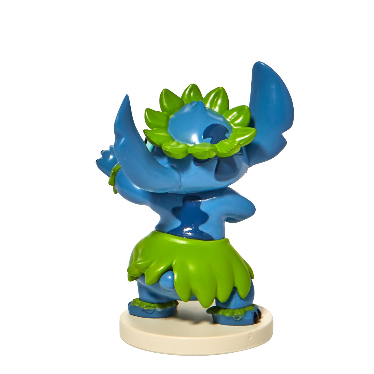Grand Jester Studios Dancing Stitch Mini Figurine This cute and fun dancing Stitch mini figurine by Grand jester Studios is the perfect addition to any Stitch or Disney collection. Dressed in his finest grass skirt, Stitch is ready to show off his dancing skills at the luau.