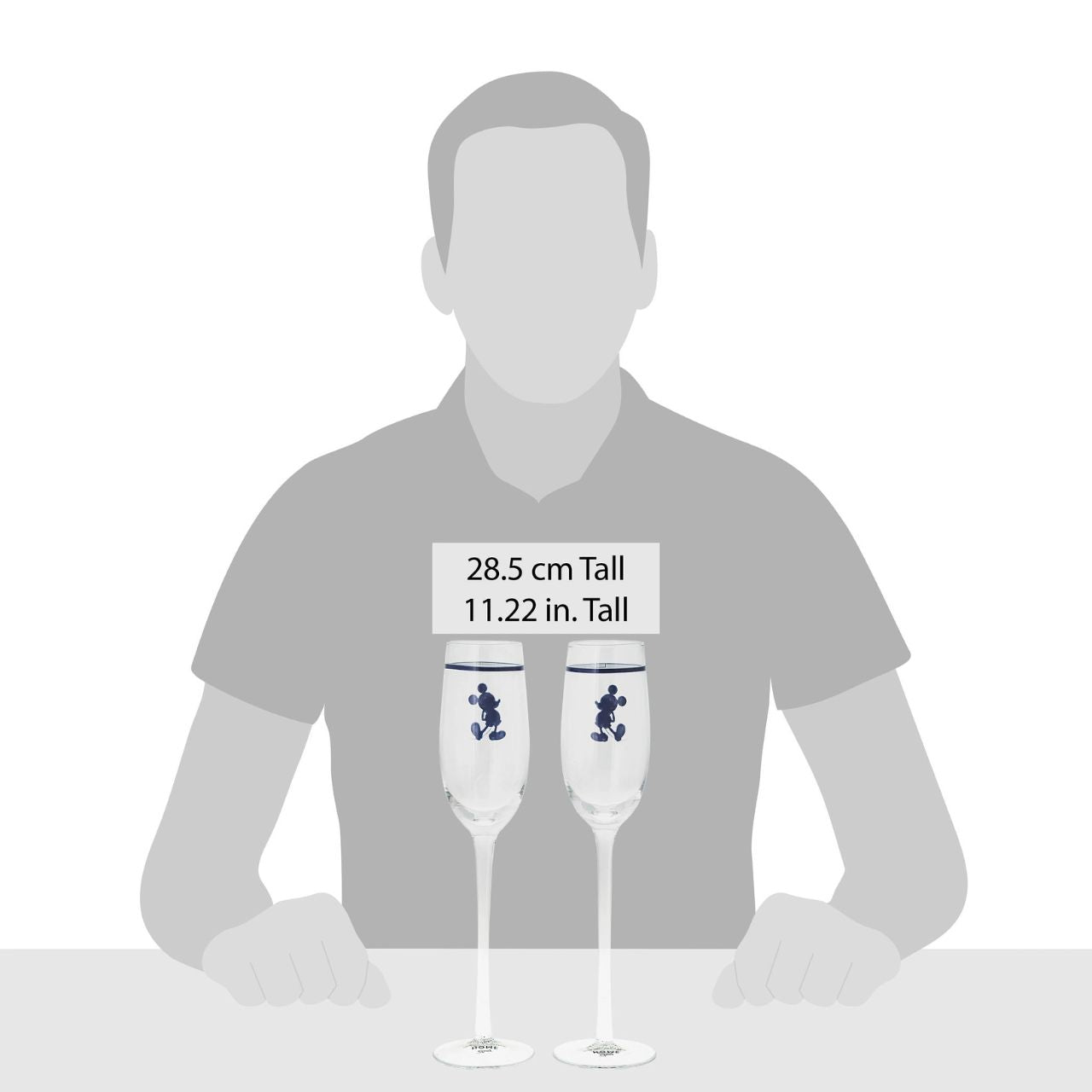 Introducing Disney silhouette Mickey Mouse Toasting Glasses - This set of two toasting glasses will elevate any celebration. With a touch of Disney magic these Toasting glasses feature the iconic and beloved silhouette of Mickey Mouse.