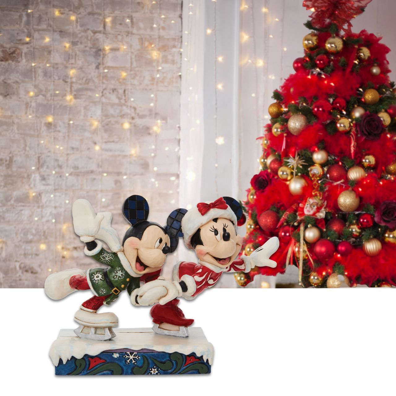 Disney Mickey and Minnie Ice Skating Figurine Skating together, Mickey and Minnie Mouse warm the winter with their timeless love story. Hand in hand the pair enjoy each other's company in stunning snowflake tunics in this Jim Shore creation.