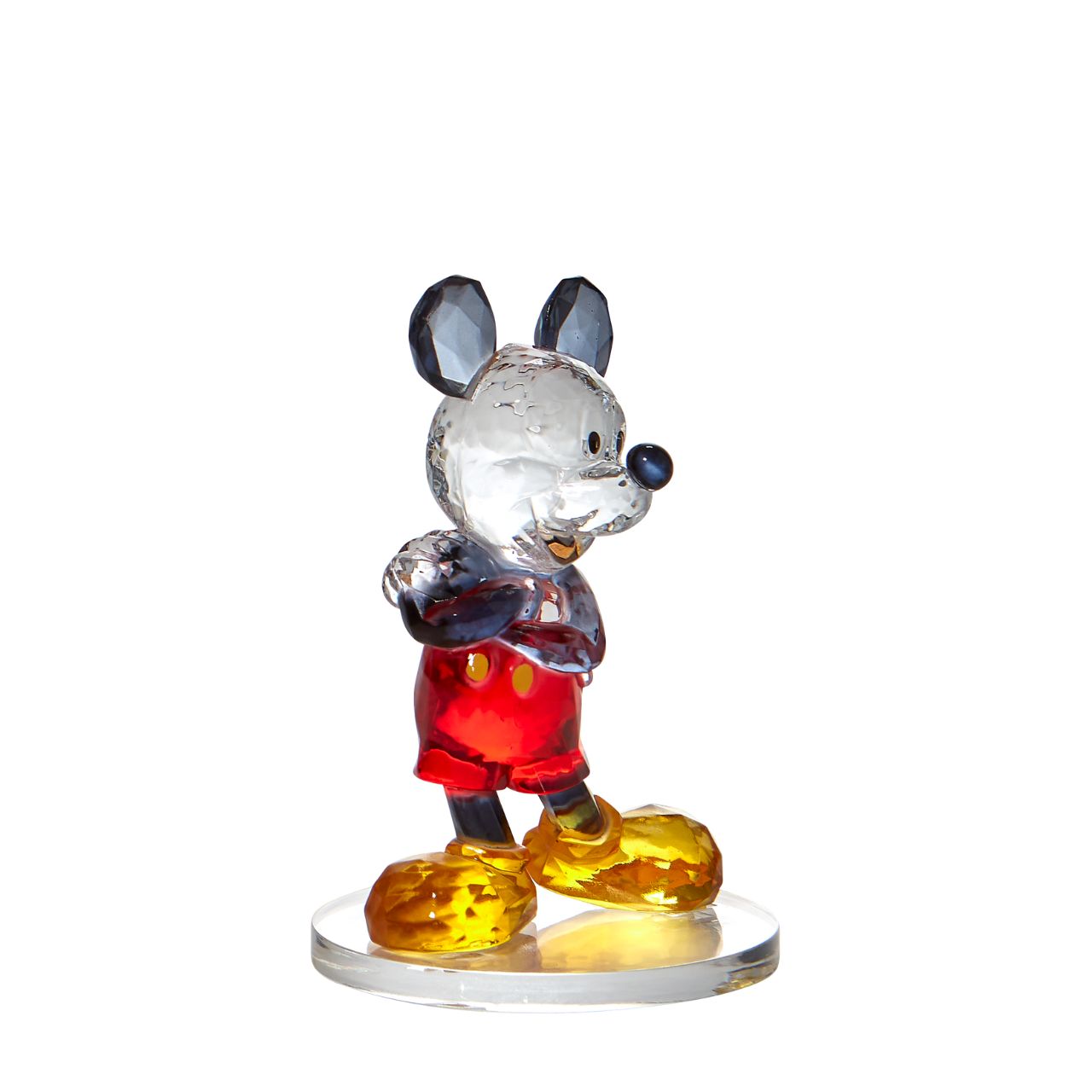 This "gem cut" acrylic sculpture reflects Mickey Mouse's dazzlingly cheerful personality. Presented in a branded window gift box. Not a toy or children's product. Intended for adults only.
