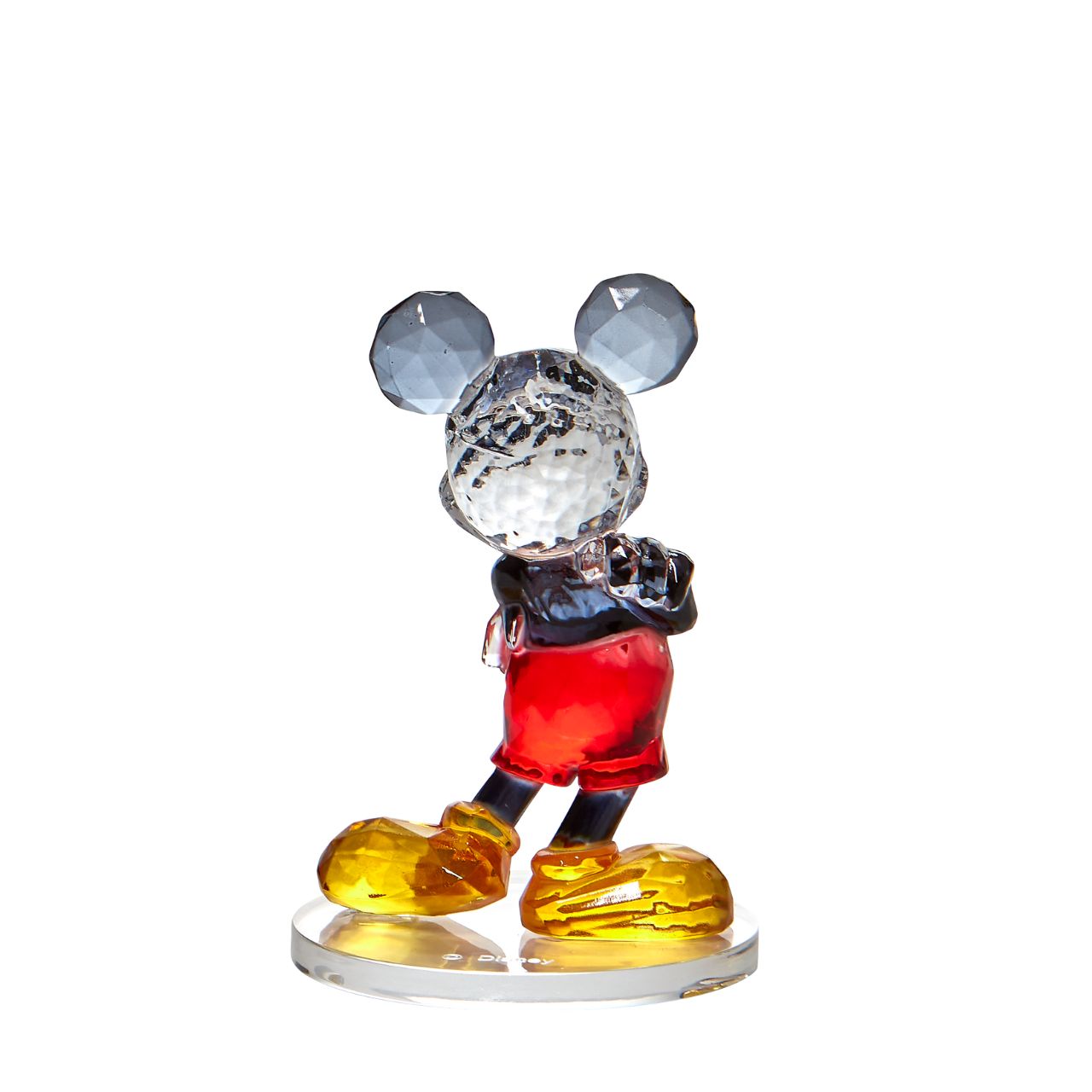 This "gem cut" acrylic sculpture reflects Mickey Mouse's dazzlingly cheerful personality. Presented in a branded window gift box. Not a toy or children's product. Intended for adults only.