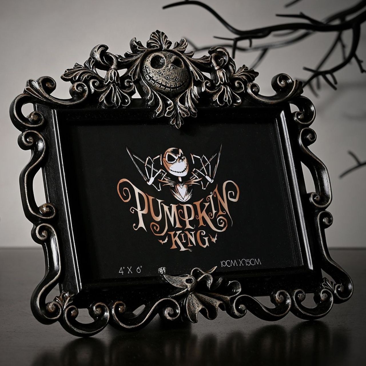 Step into the whimsical world of The Nightmare Before Christmas with this spellbinding frame. Featuring a hauntingly beautiful black frame with intricate gothic designs, this enchanting piece captures the film's dark aesthetic.