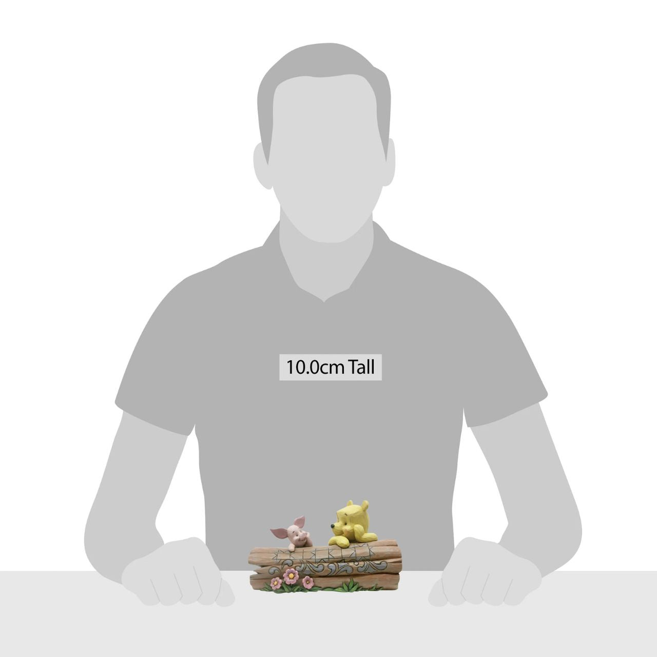 Jim Shore's Pooh and Piglet on a Log Figurine Truncated Conversation Friends Winnie the Pooh and Piglet share a thoughtful moment together in the One Hundred Acre Wood. Folk art-inspired details add to the artisanal charm of this hand-painted figurine, sculpted from high-quality cast stone.