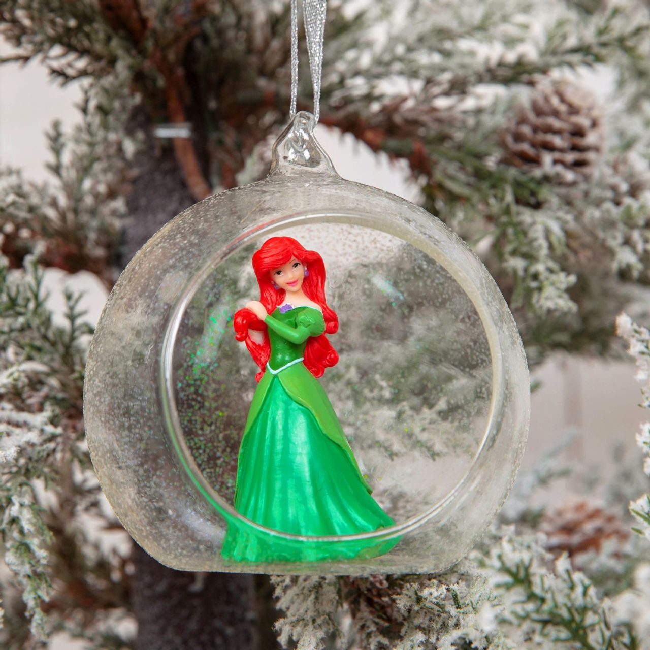 Disney Princess Ariel 3D Bauble Bring some Disney magic to your Christmas tree with this collectable Little Mermaid hanging decoration. From the Disney Princess Christmas Collection.
