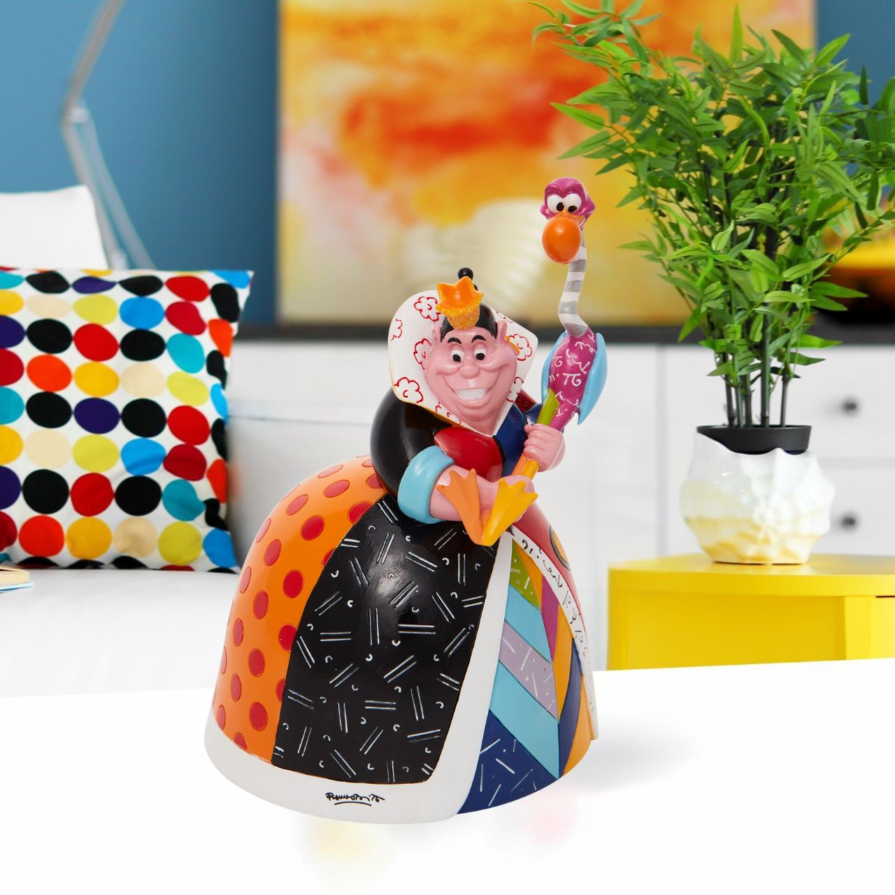 Redesigning the antagonist from Alice and Wonderland, the Queen of Hearts gets a fashionable makeover of glam and glitter. Designed in the US by Miami based Pop Artist Romero Britto in celebration of the 70th Anniversary of Disney's classic Alice in Wonderland.