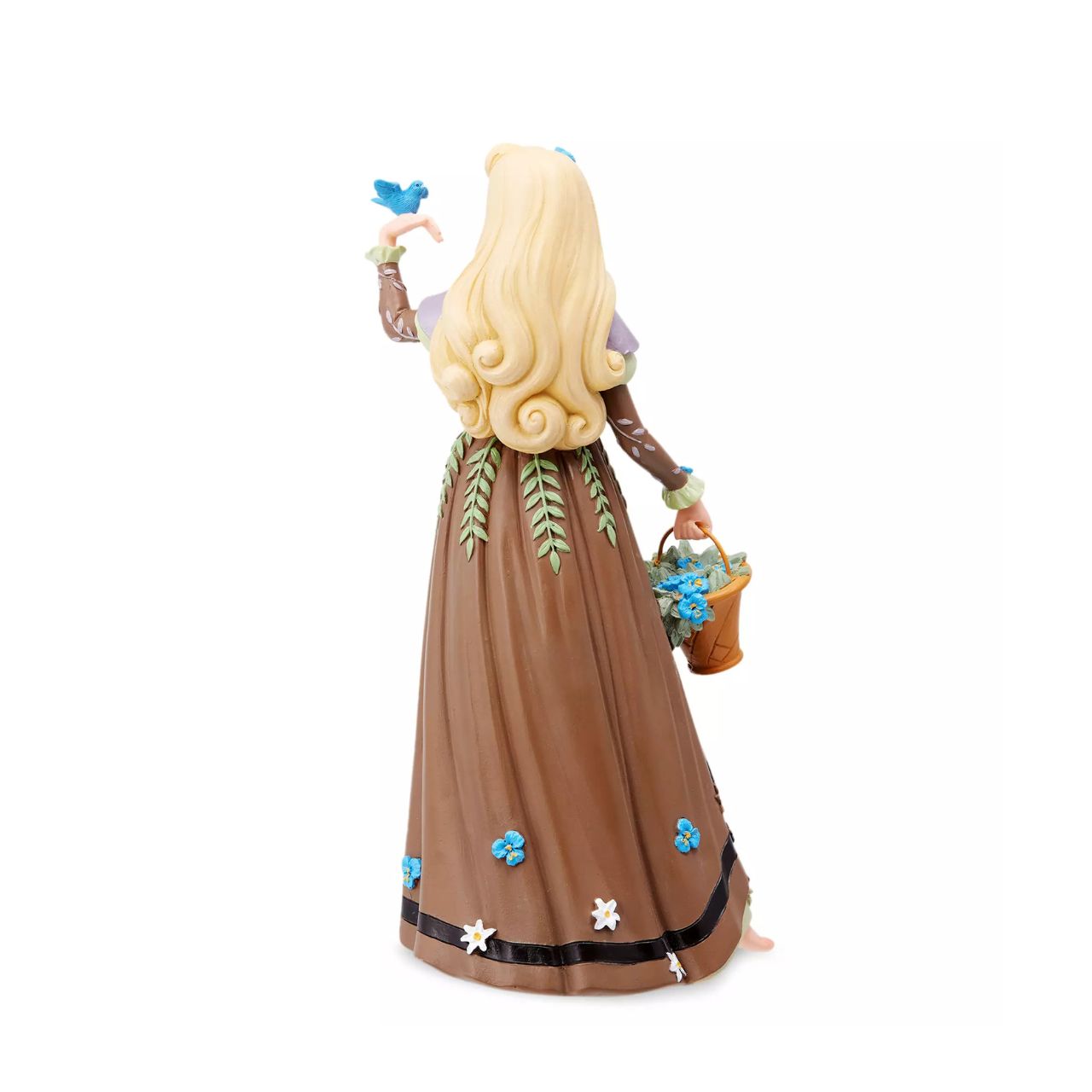 The iconic Disney princess Aurora from Sleeping Beauty is depicted here in her Briar Rose outfit. She has received the botanical treatment with delicate flowers spreading across her dress and spilling out of her basket while a bird perches on her hand.