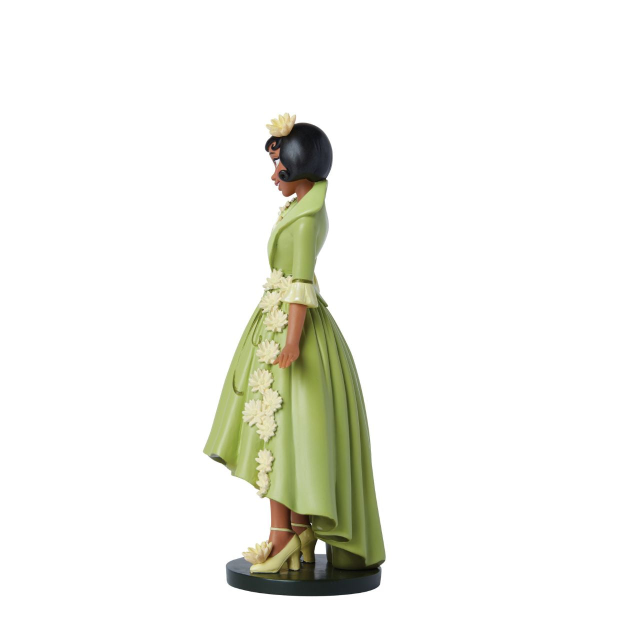 Part of the Disney Showcase Botanical collection, the Botanical Tiana figurine sees Disney's iconic princess from The Princess and the Frog in her iconic green dress adorned with delicate yellow flowers.