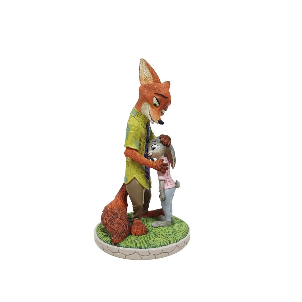 Handcrafted hand-painted resin figurine capturing Nick and Judy in a charming embrace. Part of the Disney Showcase collection, this detailed piece brings beloved characters to life with vibrant artistry and meticulous craftsmanship.