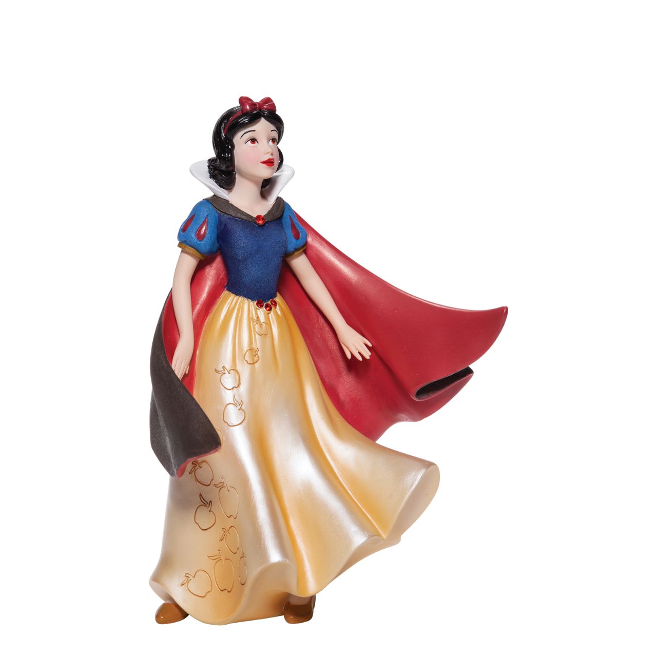 Snow White Couture de Force Figurine Snow White with her skin fair as snow and lips red as apples follows the wind on a new adventure fit for a princess. Hand-crafted and hand-painted, her iconic outfit shimmers in yellow satins and dark wool felts plussed with red faux gem stones.