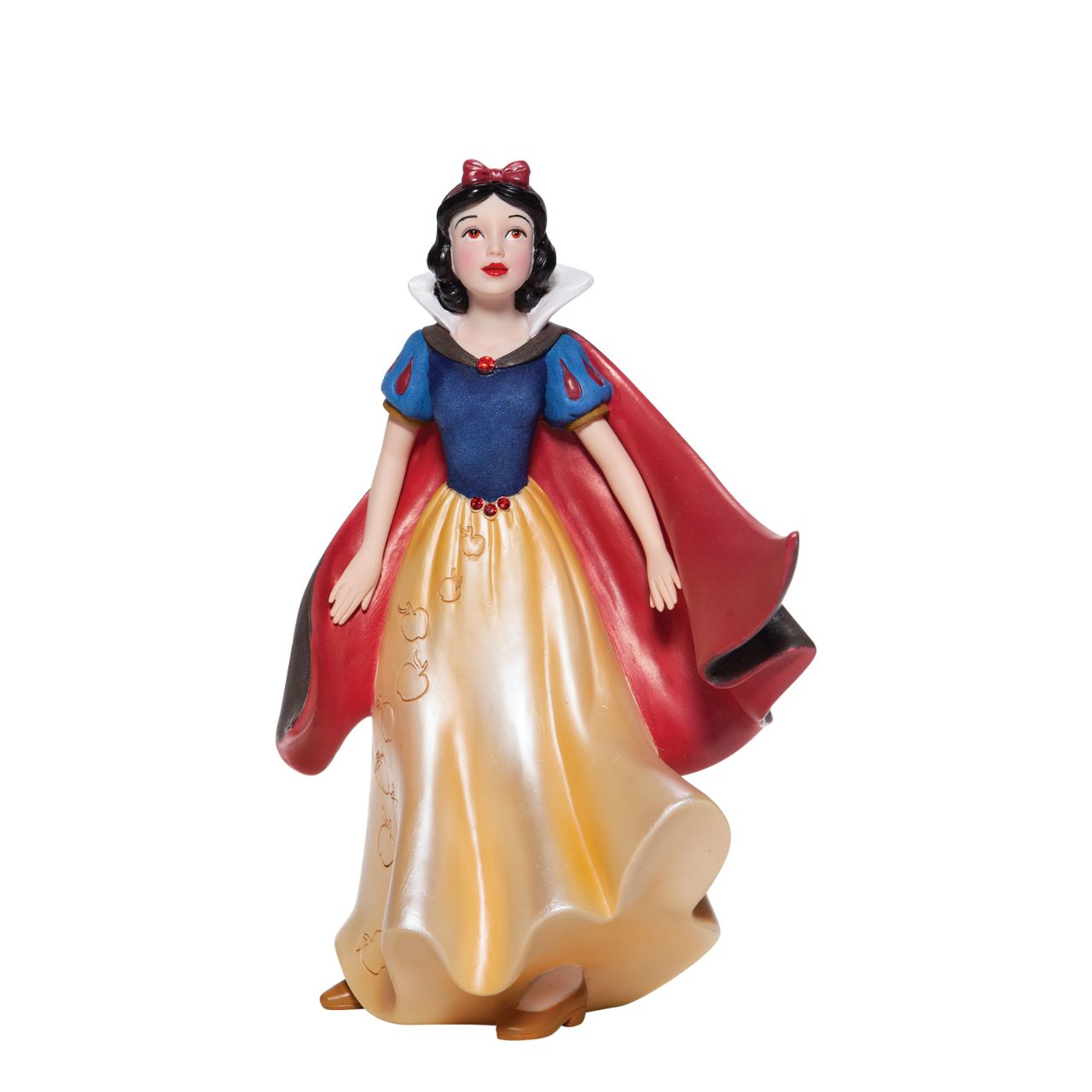 Snow White Couture de Force Figurine Snow White with her skin fair as snow and lips red as apples follows the wind on a new adventure fit for a princess. Hand-crafted and hand-painted, her iconic outfit shimmers in yellow satins and dark wool felts plussed with red faux gem stones.