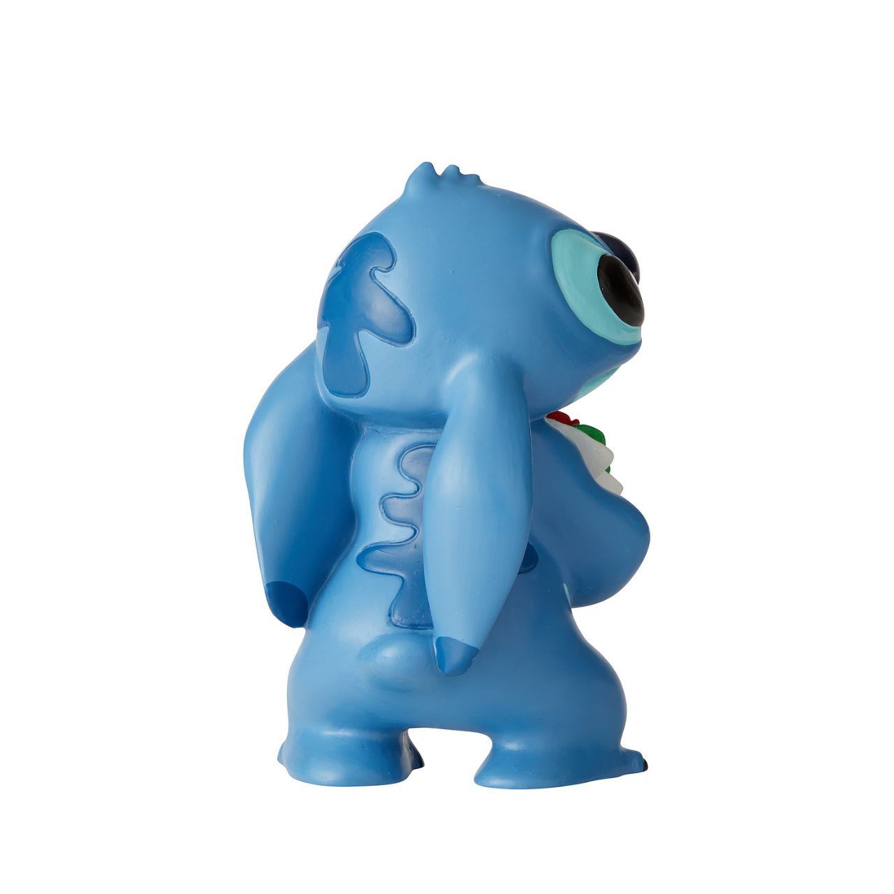 Disney Showcase Stitch Flowers Figurine Don't fret, Stich. Of course we forgive you. How can you resist such a cute face? Lilo taught Stitch to love and he's here to say "I love you, too."