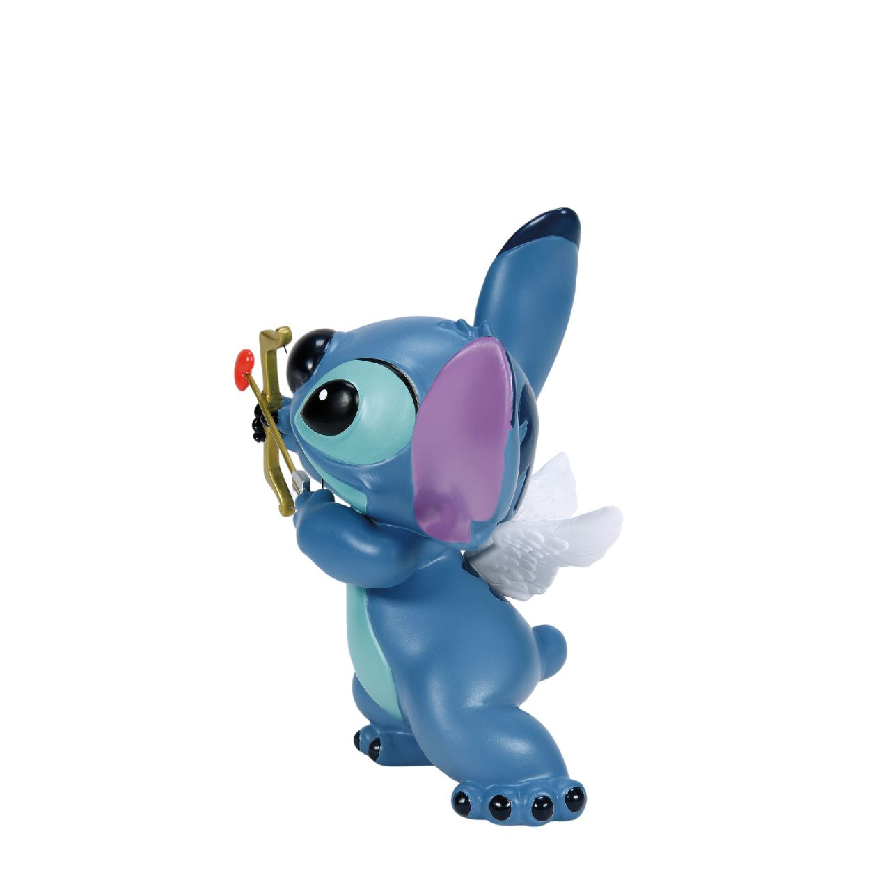Meet our Stitch Valentine's Moment Figurine, the perfect blend of love and mischief. Handcrafted in vibrant detail, this piece features Stitch charmingly dressed as Cupid, wings and all. Sure to draw hearts and smiles, this romantic, whimsical piece is ideal for Disney fans or anyone yearning for a splash of enchantment.