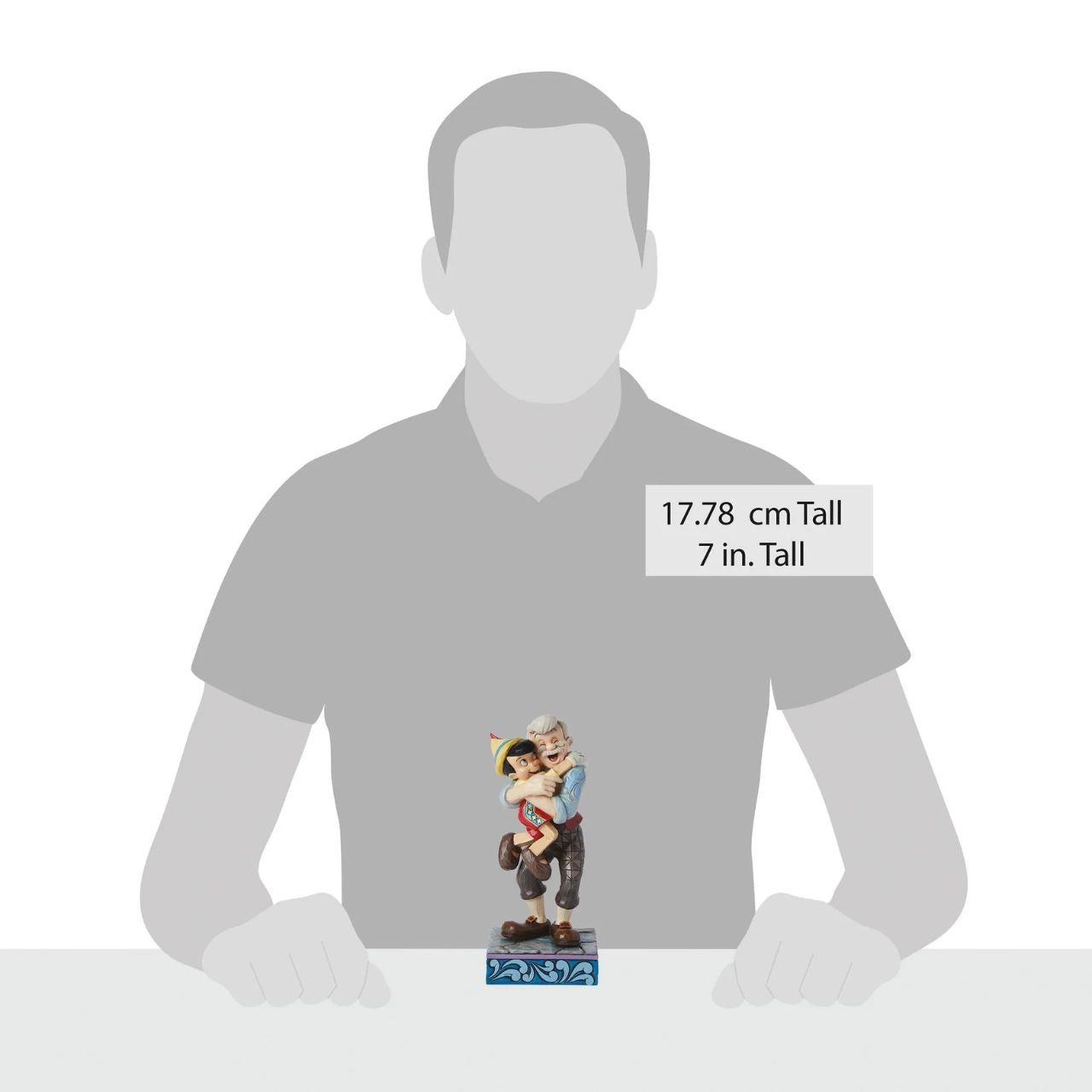 Gepetto and Pinocchio show the perfect love between a boy and his father. Hand painted for the Disney Traditions collection. Comes in a fully branded gift box.