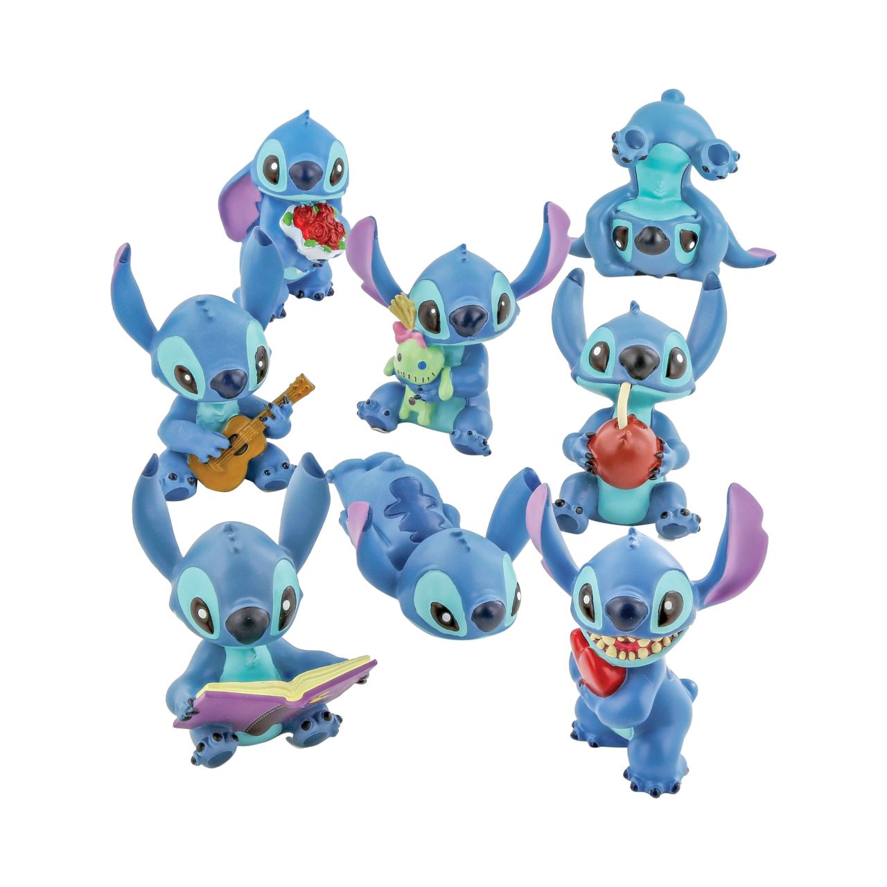 Disney Showcase Stitch Book Figurine Even adorable Stitch loves a good read. Yes he is cute, charismatic and clever. Ohana means family , making this delightful Stitch a much welcomes addition to the collection of six minis . Hand-painted and hand crafted, Stitch is supplied in a windowed branded gift box.
