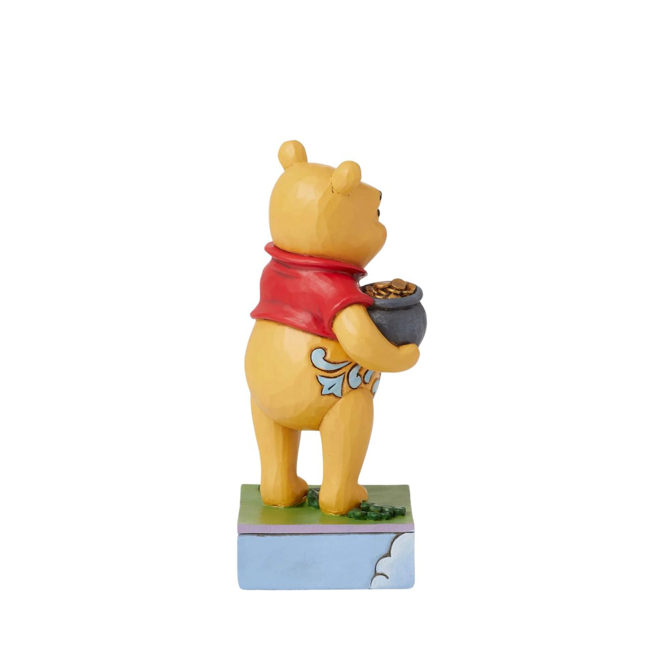 Disney's Winne the Pooh has an abundance of luck with his four-leaf clover. This cute piece if from the Disney Traditions collection by Jim Shore and is hand carved and painted before being packaged in a fully branded gift box.