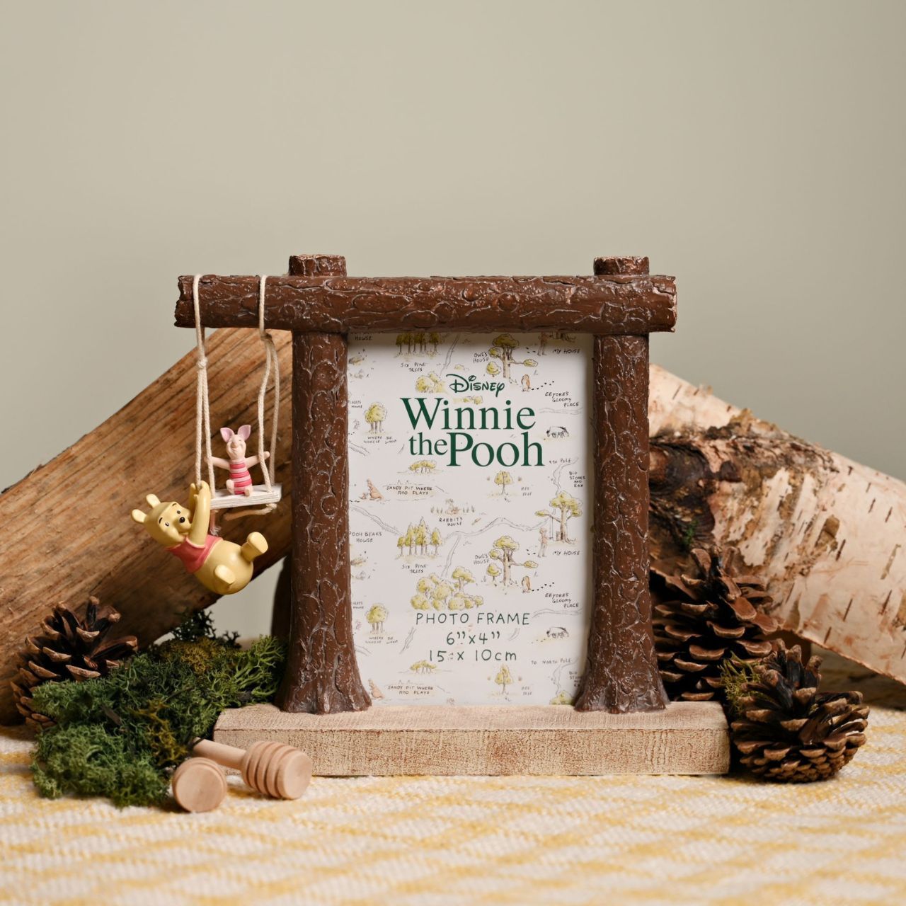 A delightful Winnie-the-Pooh and Piglet swing photo frame from DISNEY.