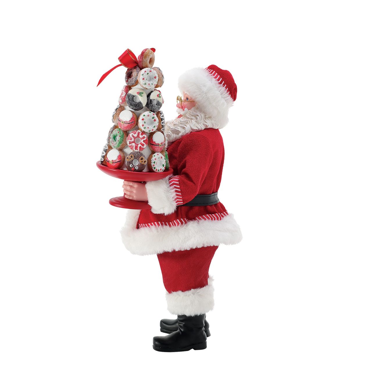 Donut Tower from Possible Dreams captures Santa in with a pile of sweet treats. Carefully balancing his plate, this piece has been made with high quality cast stone and dressed in Clothtique - a stiffened fabric - to ensure that it keeps its shape for all the years you display it during the festive period.