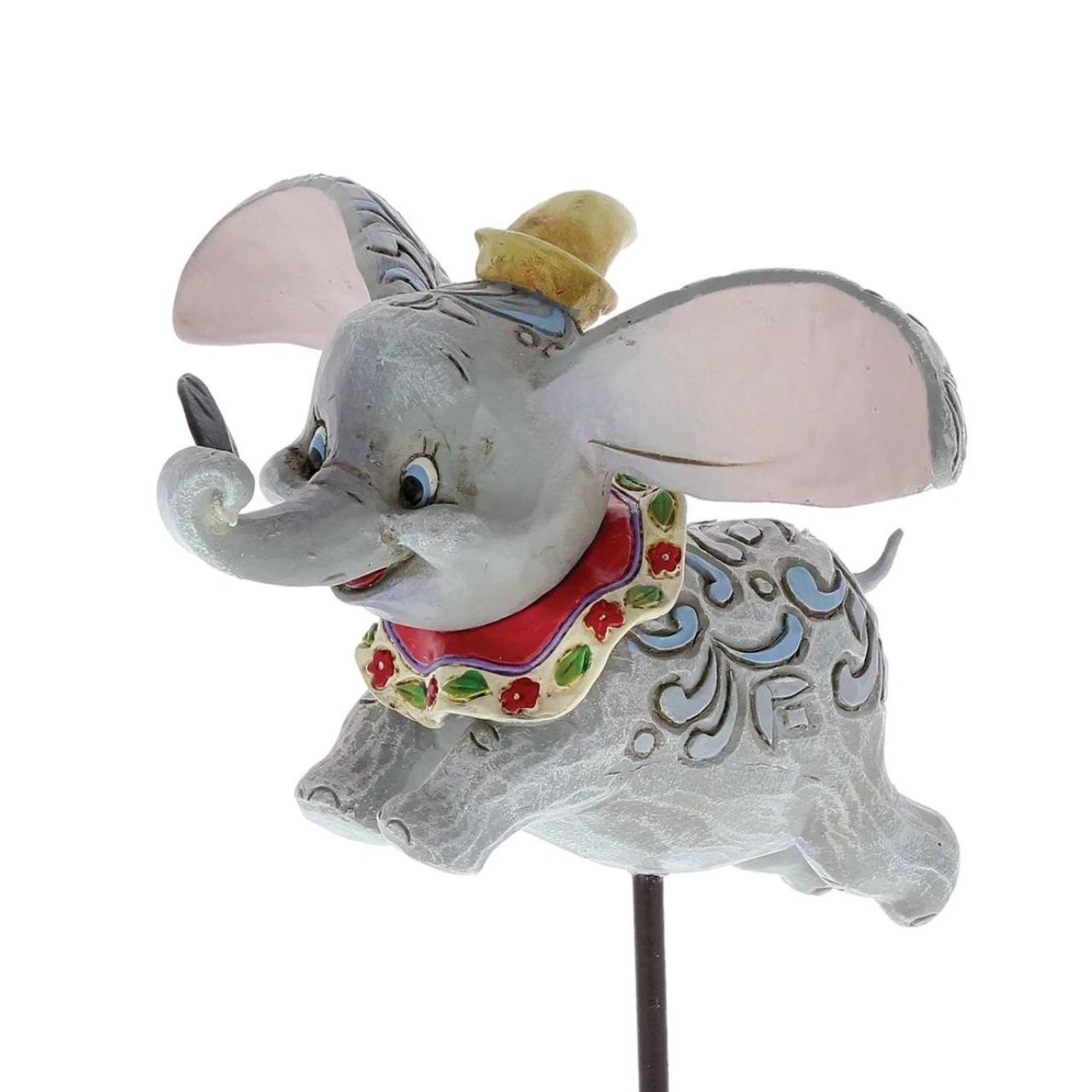 Jim Shore Dumbo Faith in Flight Figurine Faith in Flight (Dumbo Figurine) Disney Traditions combines the magic of Disney with the American folk artistry of Jim Shore. Enjoy this wonderful figurine of beloved Dumbo as he takes his first flight with the help of a magical feather.