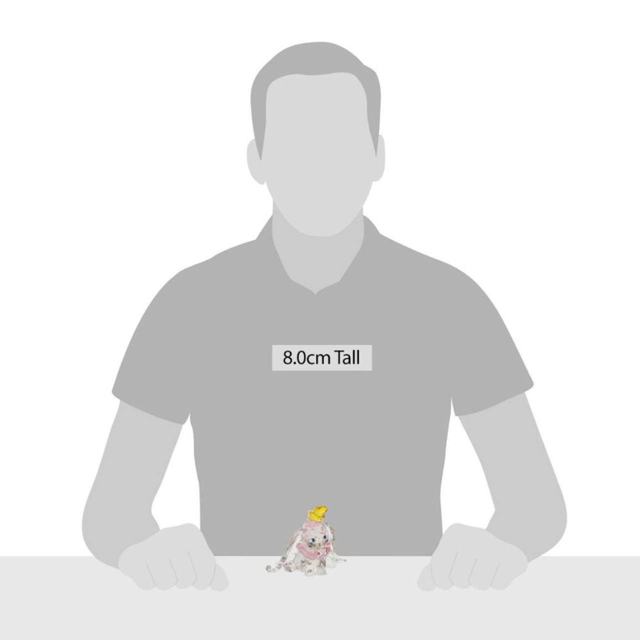 This "gem cut" acrylic sculpture reflects the ninth wonder of the universe. The world's only flying elephant. Dumbo is already for his circus debut with his yellow hat and pink collar. Presented in a branded window gift box. Not a toy or children's product. Intended for adults only.